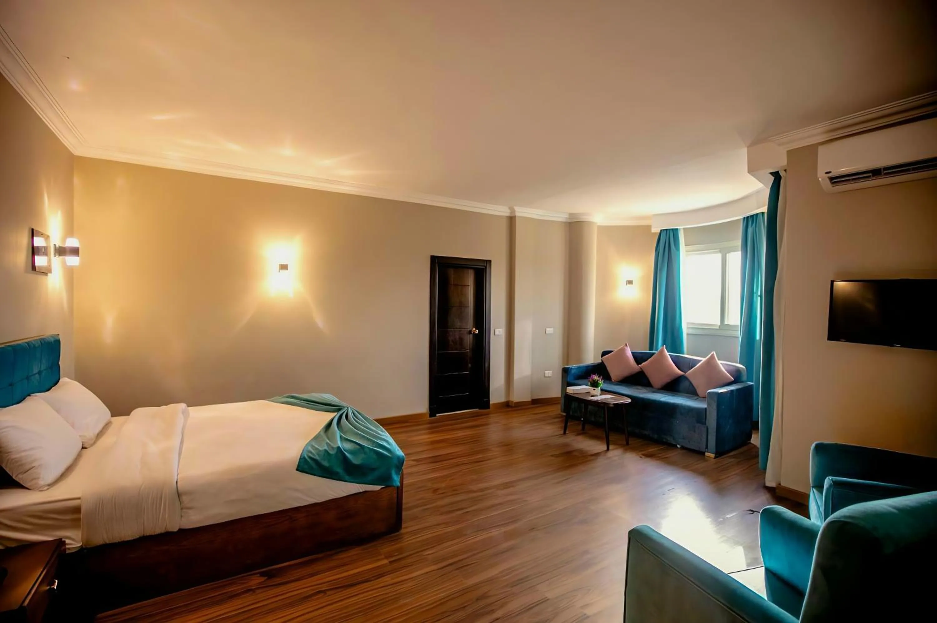 Bed in Pyramids Oasis Hotel