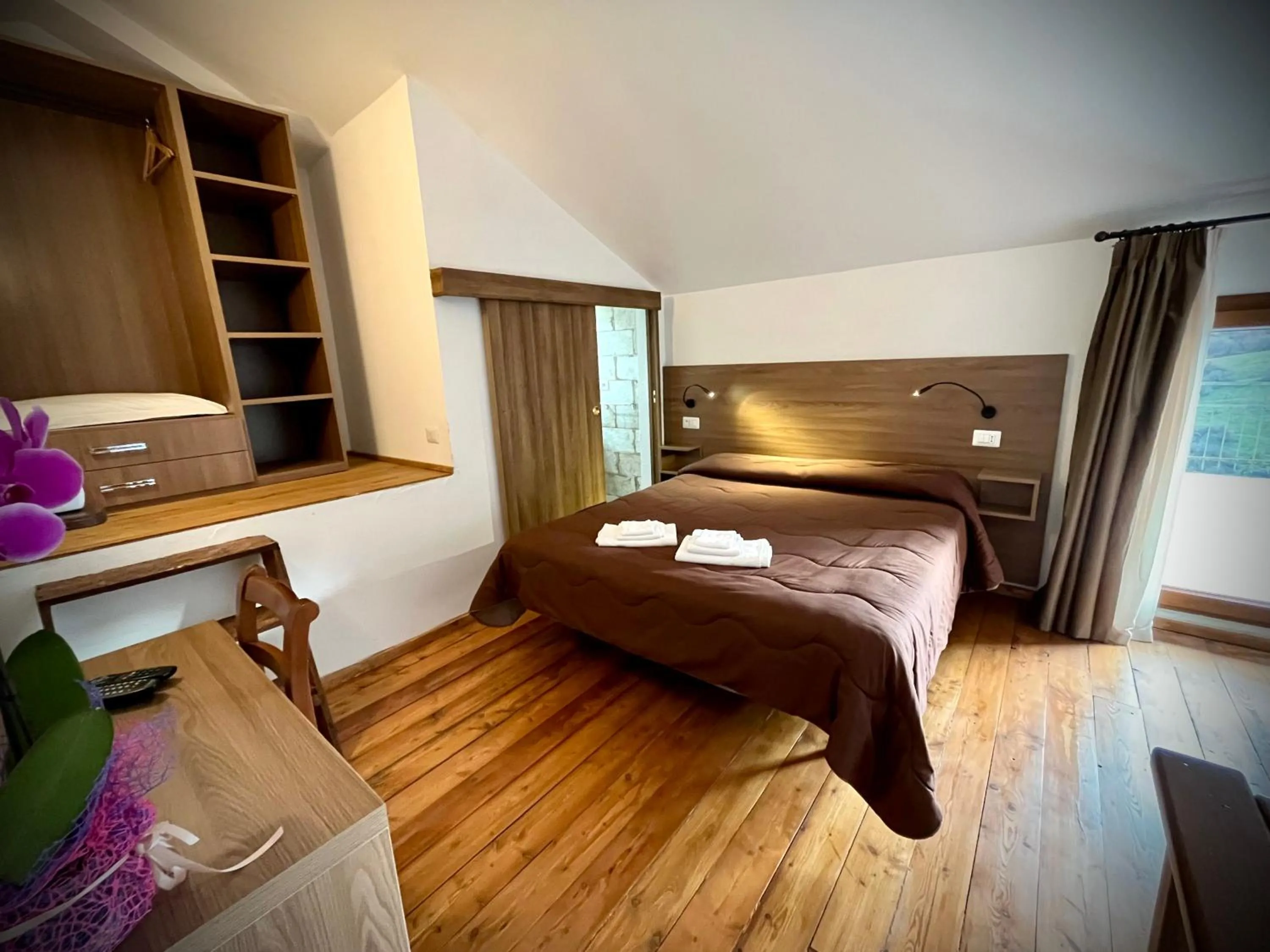 Bed in Hotel Pinguino