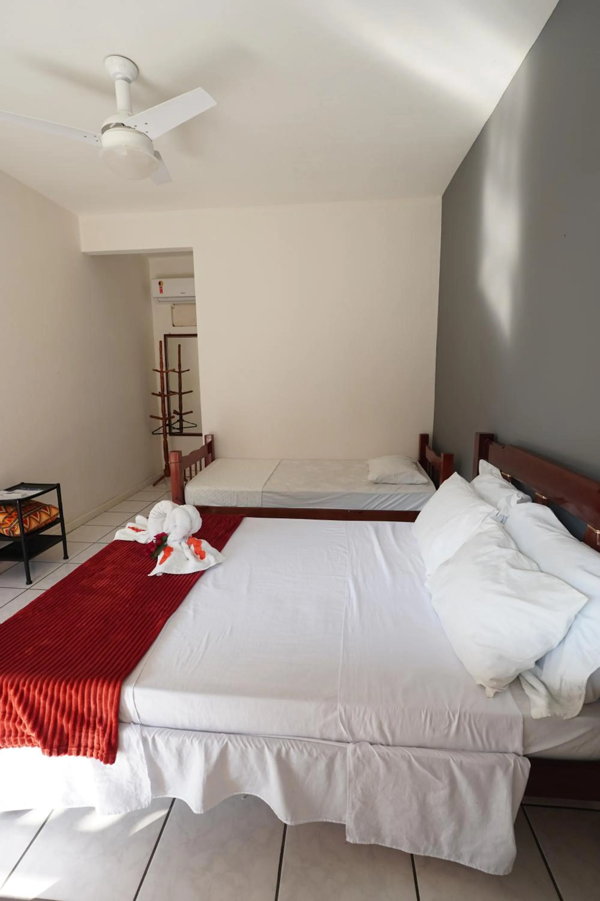 Bed in Pousada Frezza Mergulho