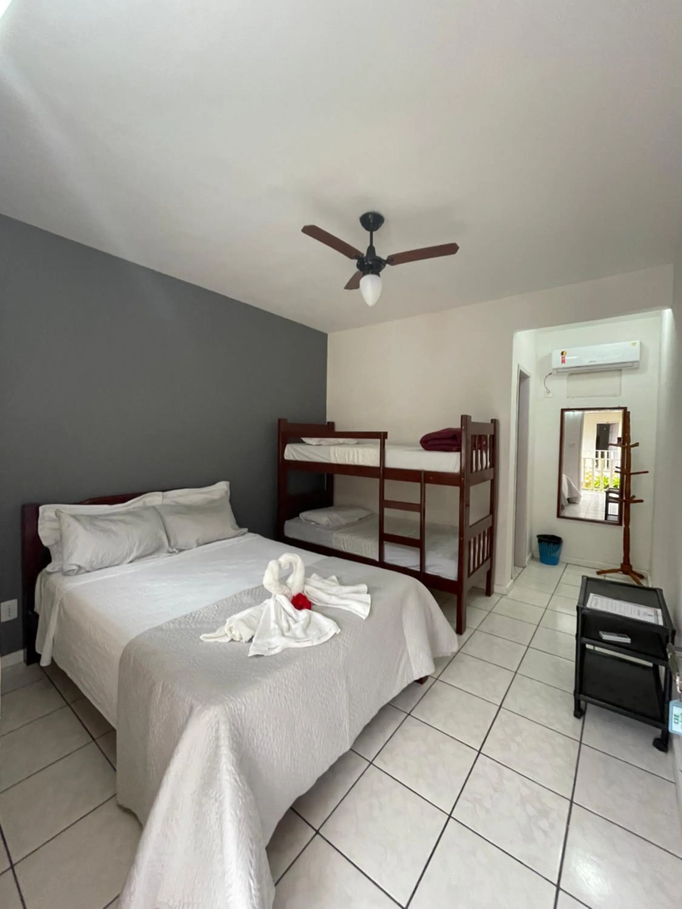 Bed in Pousada Frezza Mergulho