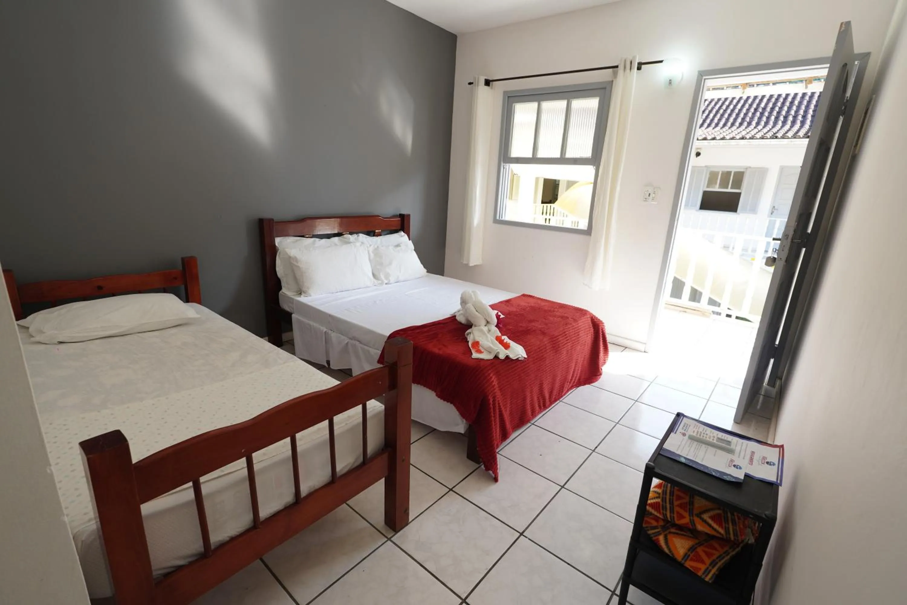 Bed in Pousada Frezza Mergulho