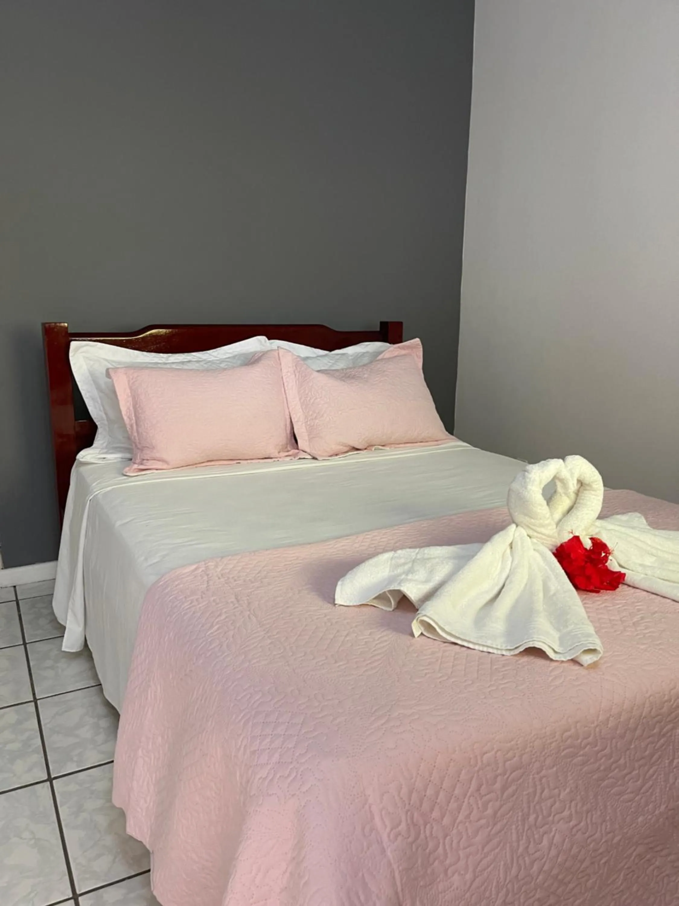 Bed in Pousada Frezza Mergulho