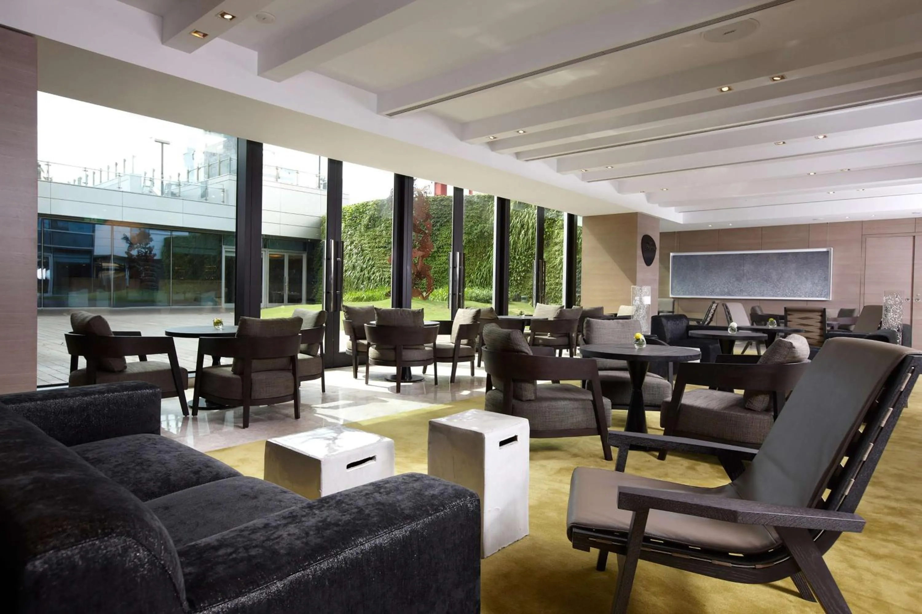 Dining area in Humble House Taipei, Curio Collection by Hilton