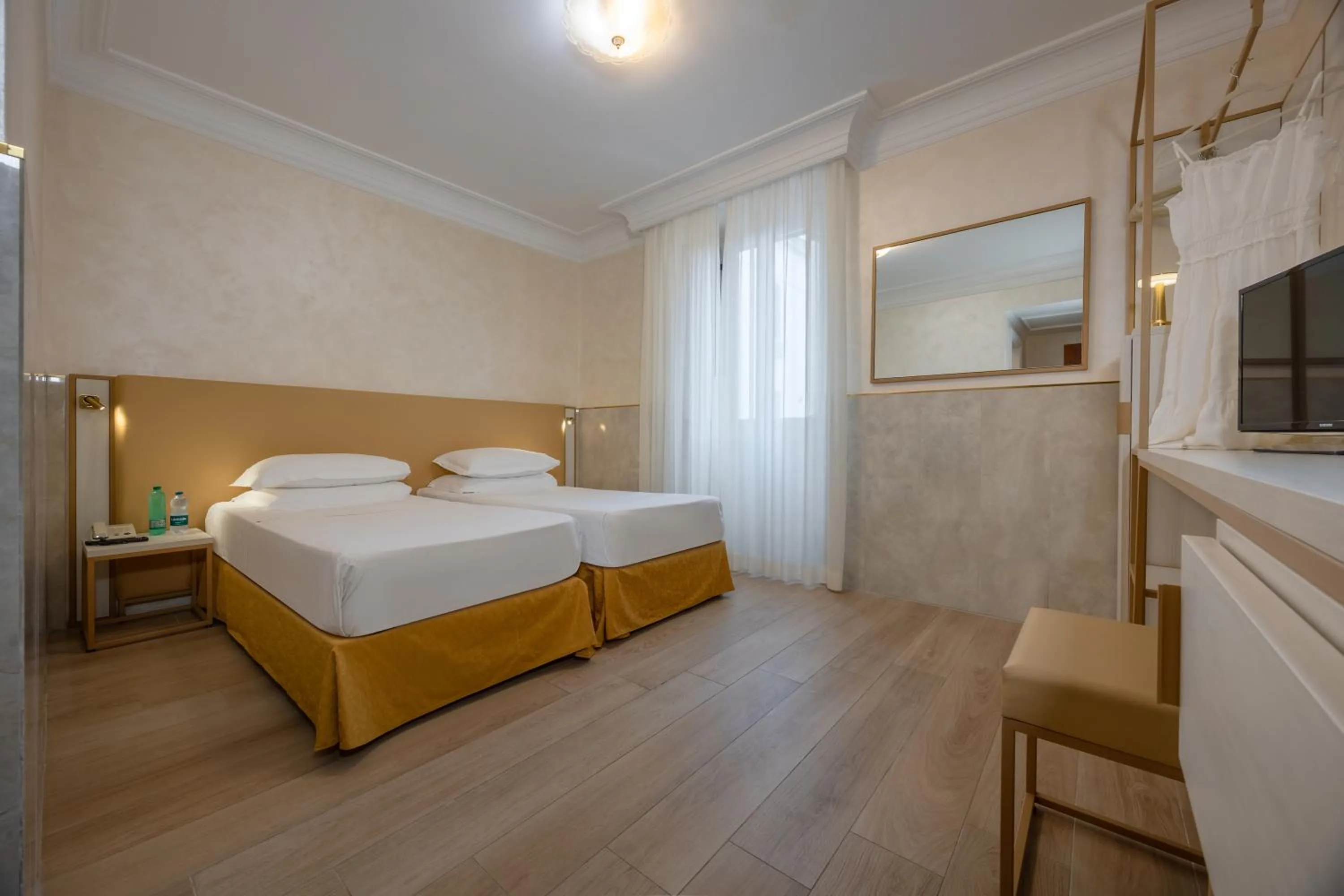 Bed in Hotel Palladium Palace