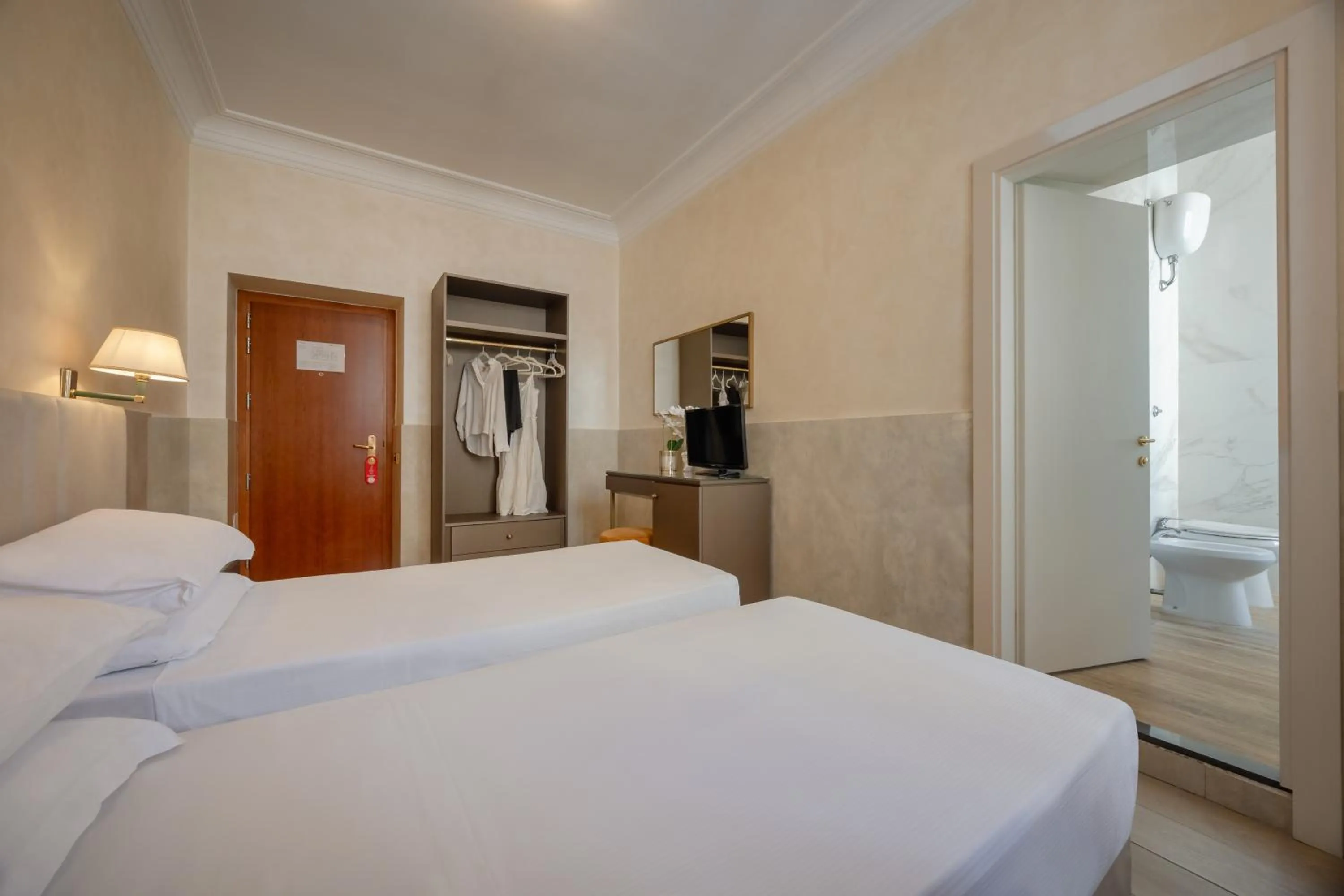 Bed in Hotel Palladium Palace