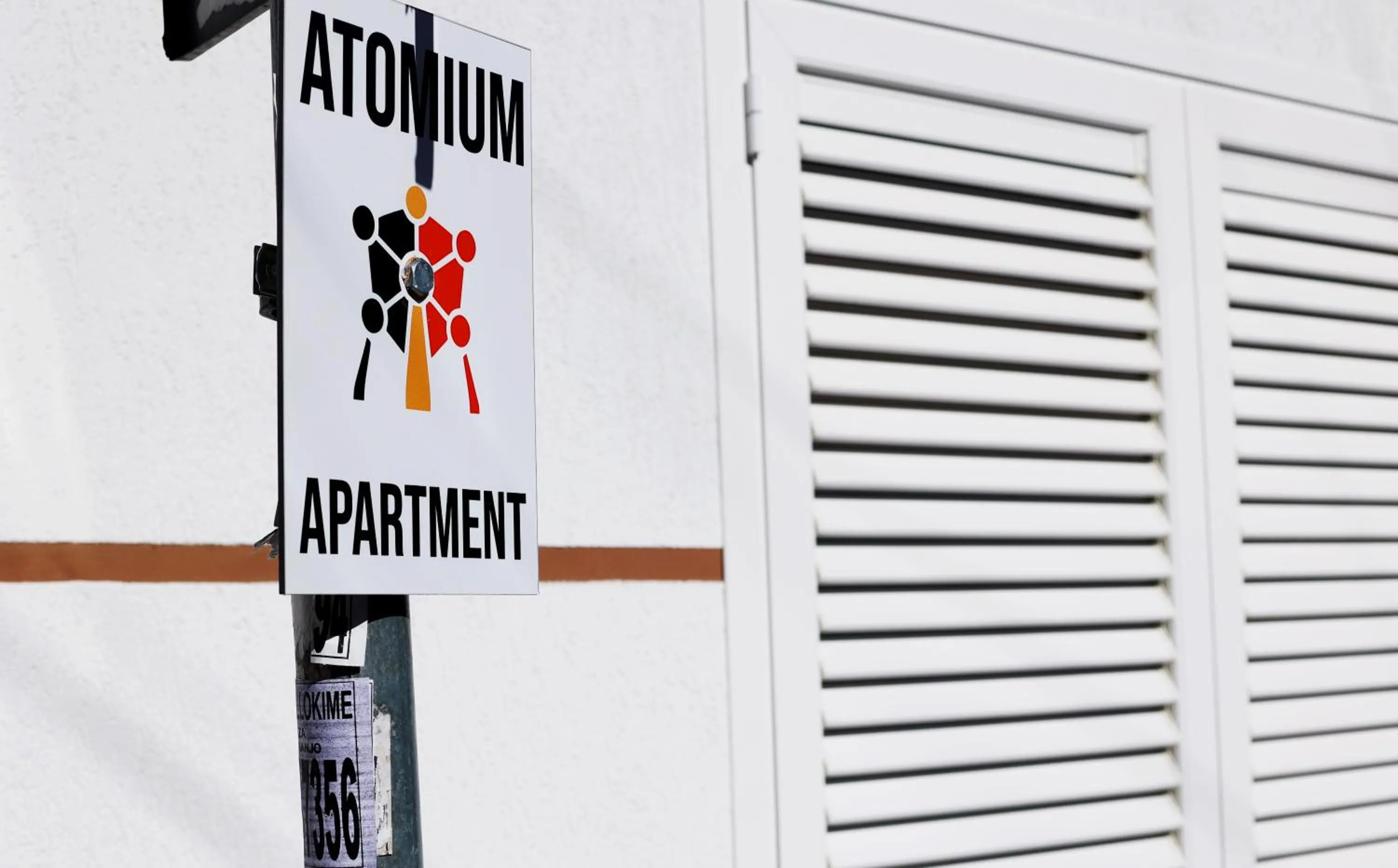 Property logo or sign in Atomium apartments