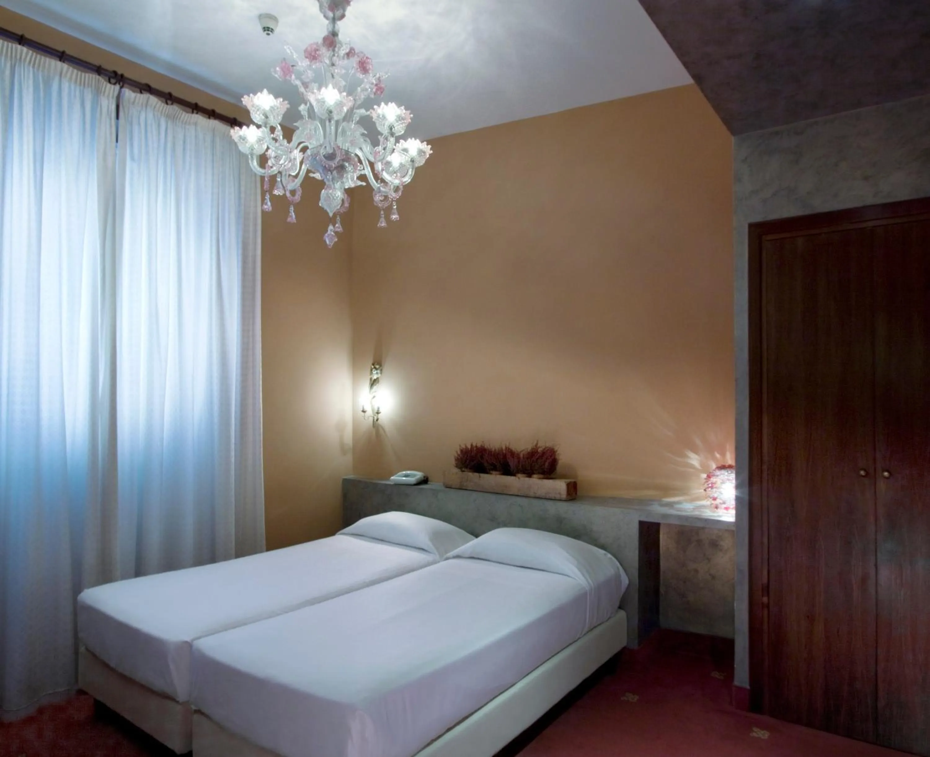 Bed in Hotel Columbia