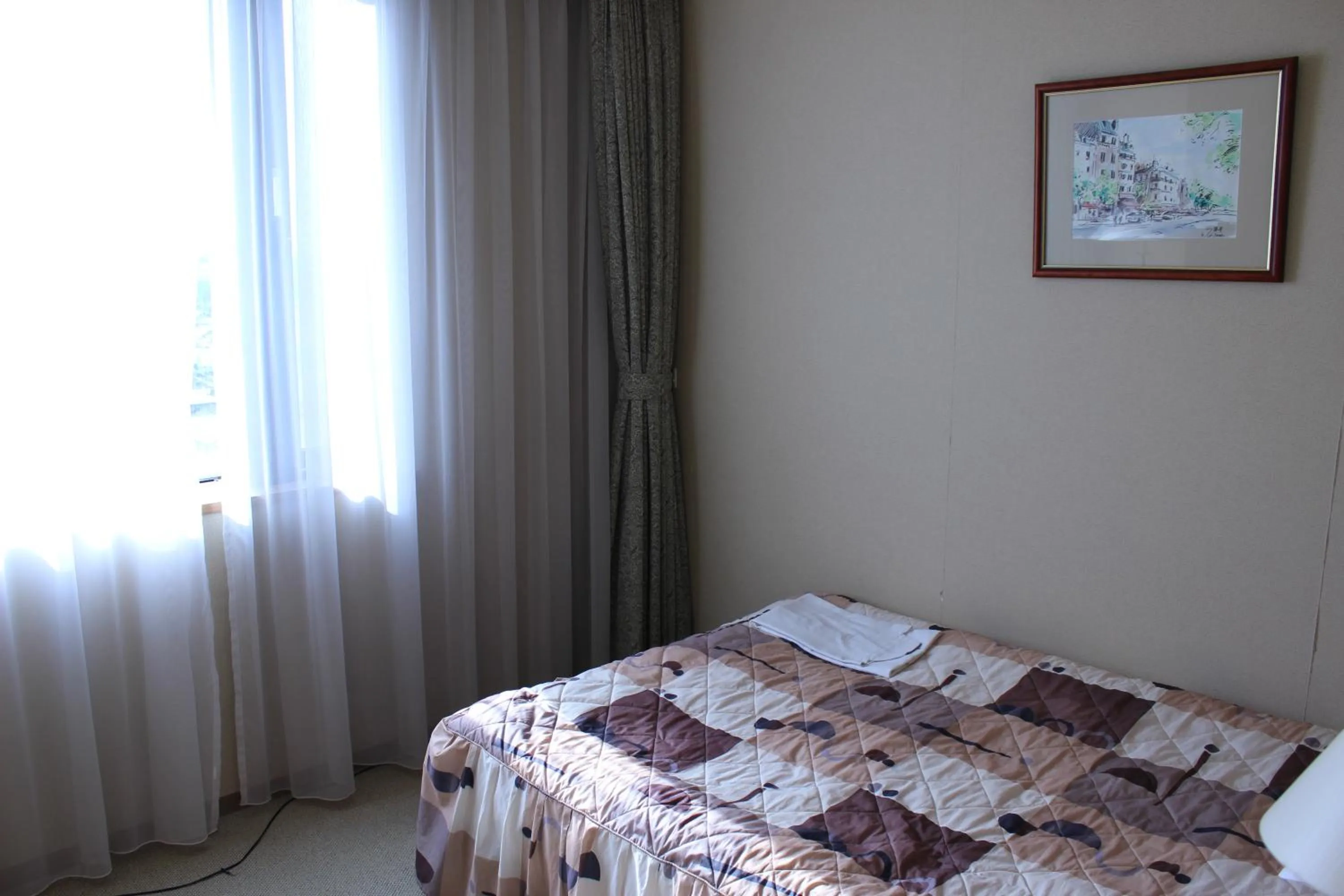 Bed in Grand Hotel Hakusan