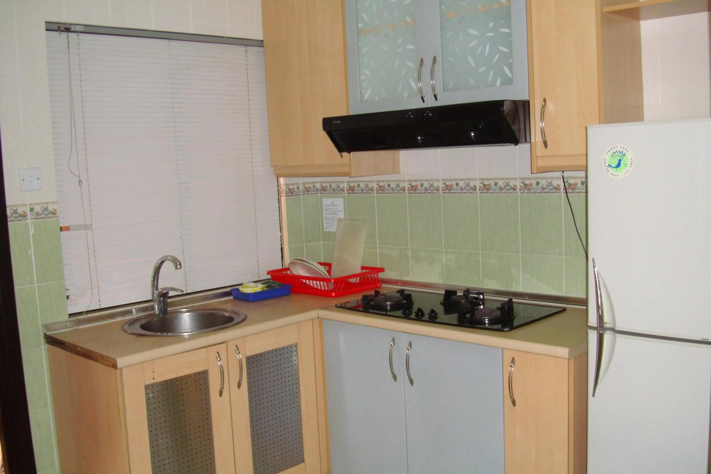Kitchen or kitchenette in Dorcas Service Apartment - Marina Court