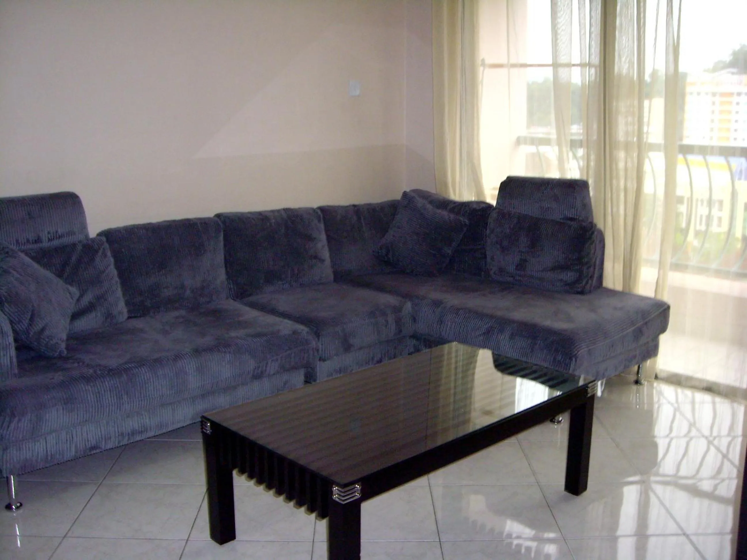 Living room in Dorcas Service Apartment - Marina Court