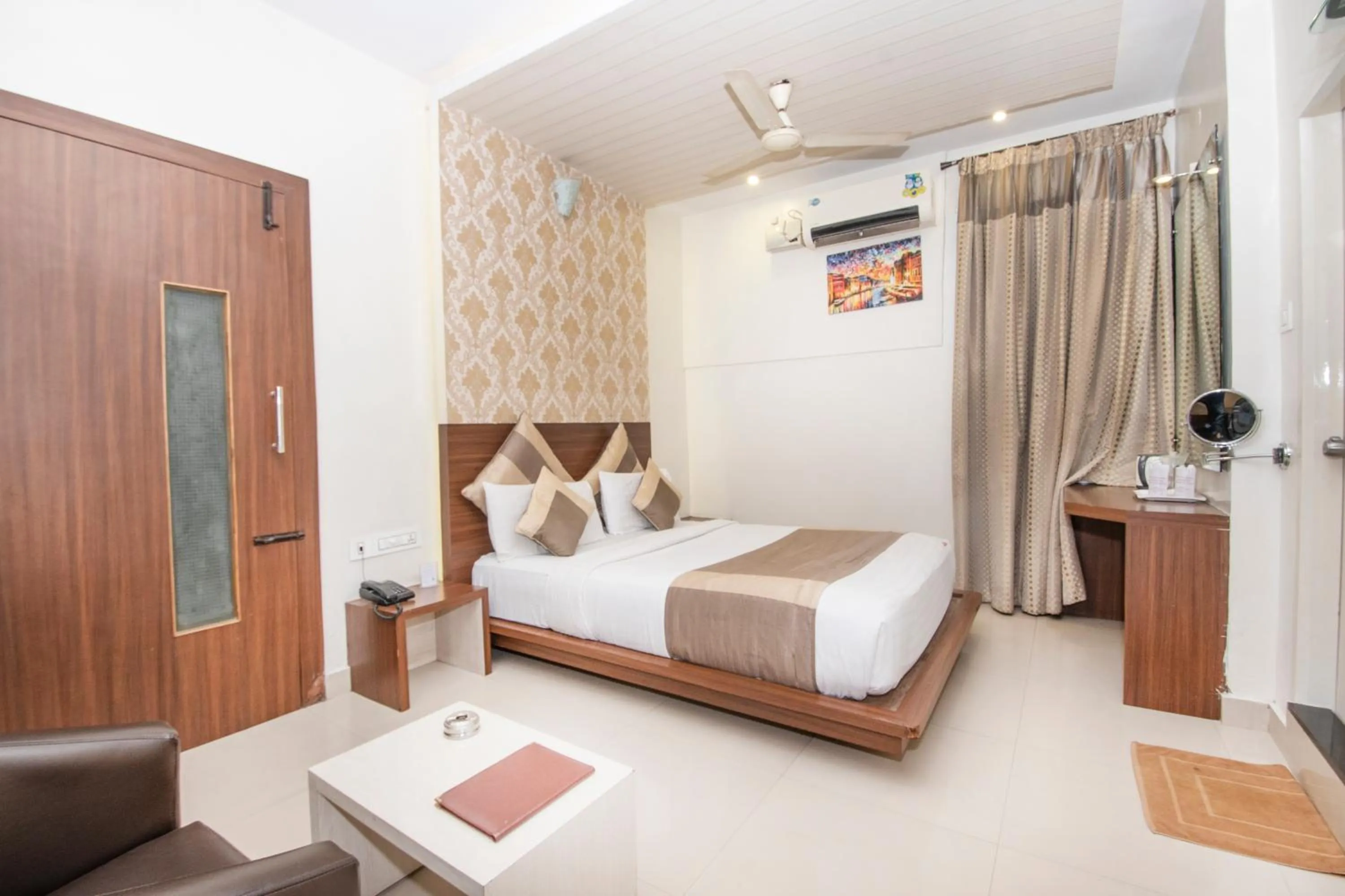 Bed in Aishwarya Suites