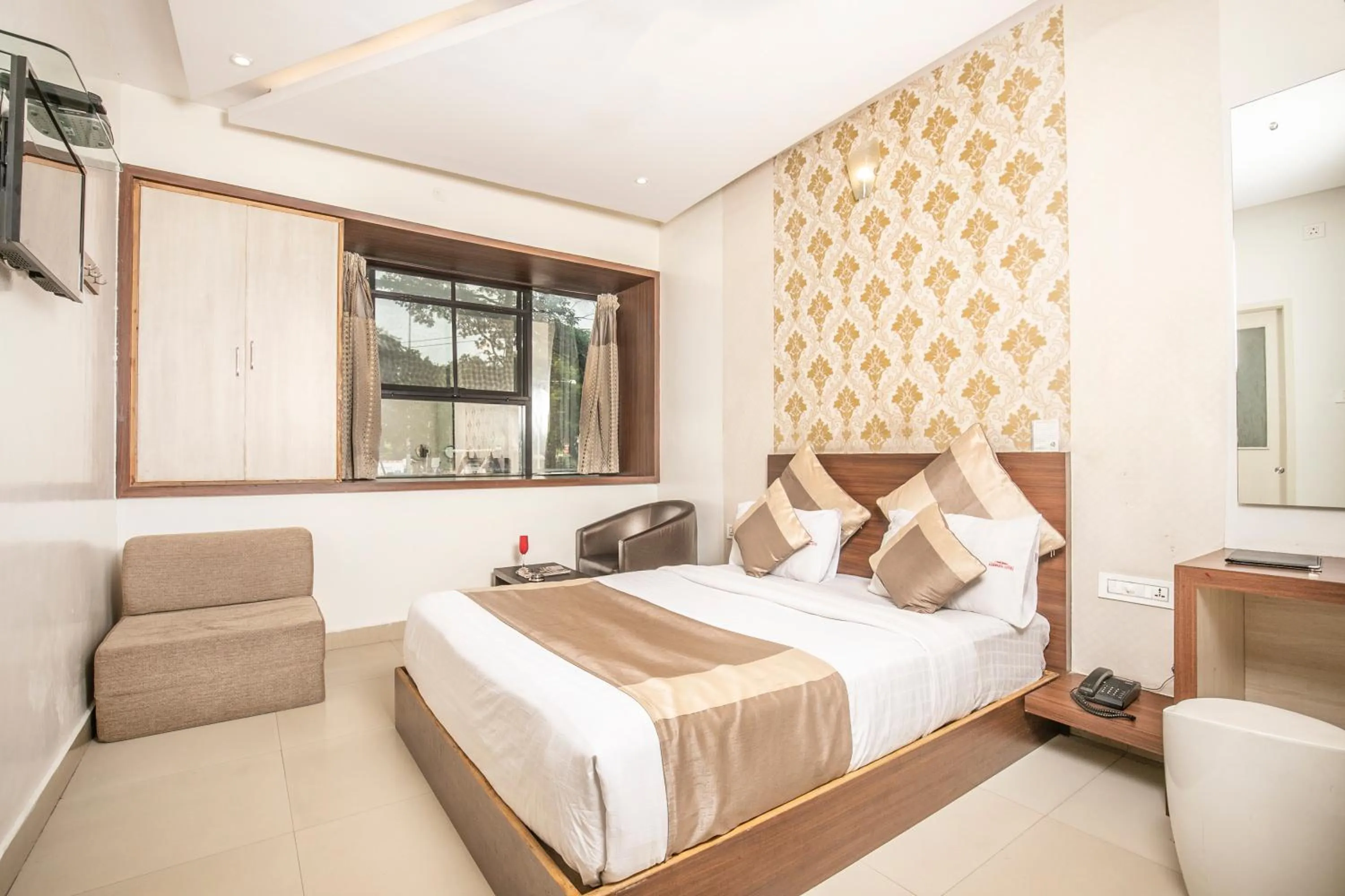 Bed in Aishwarya Suites