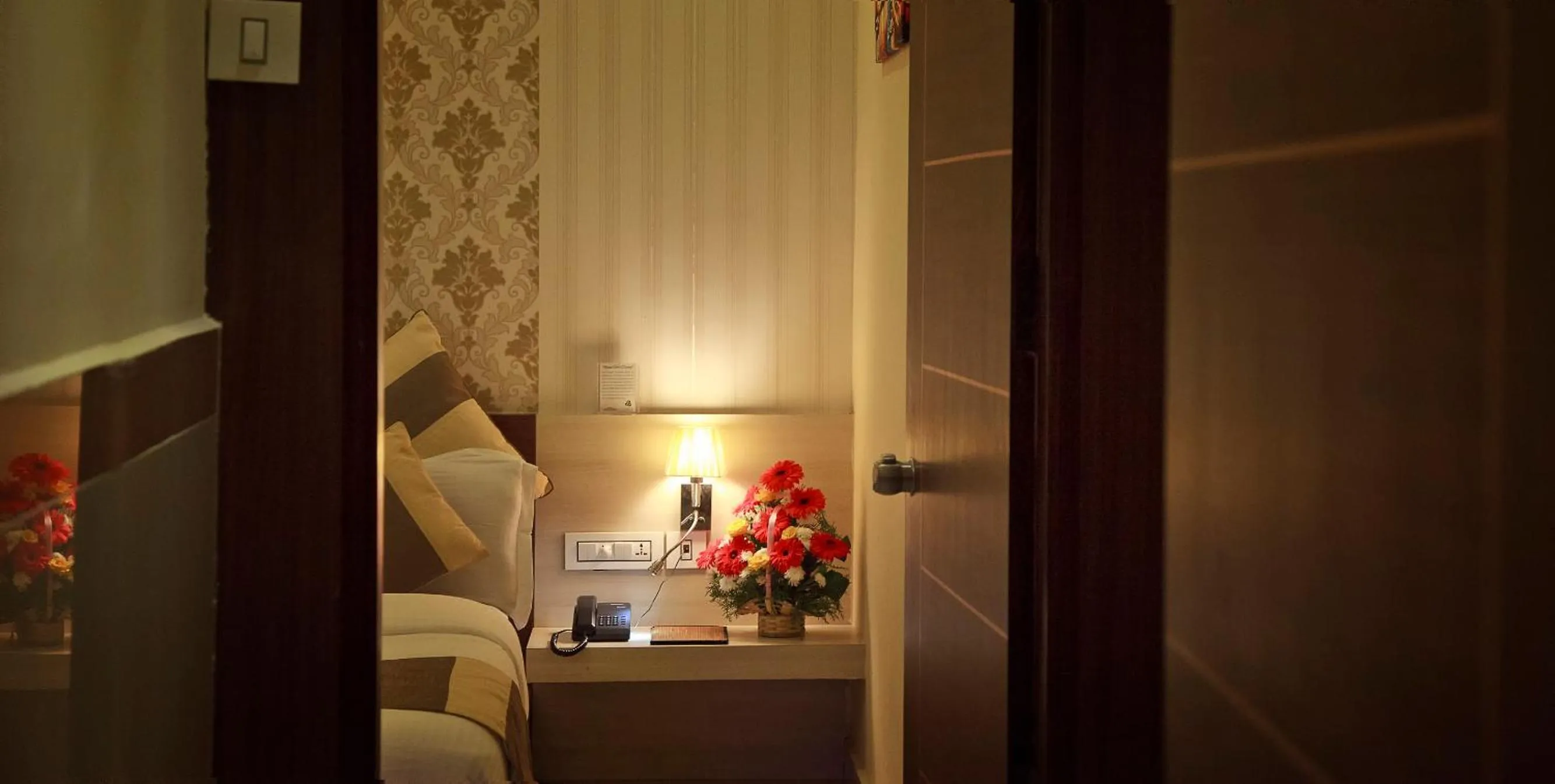 Bed in Aishwarya Suites