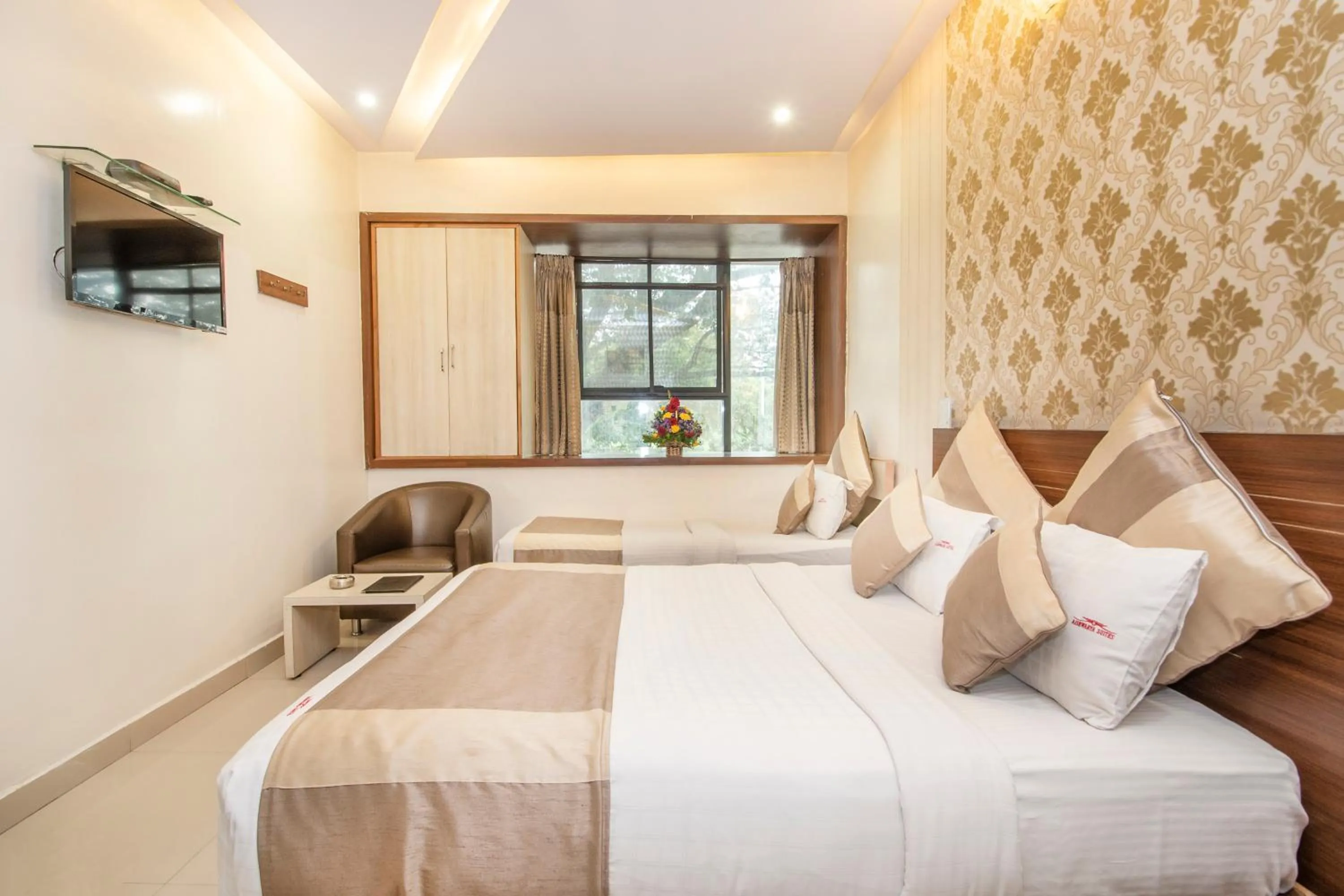 Bed in Aishwarya Suites