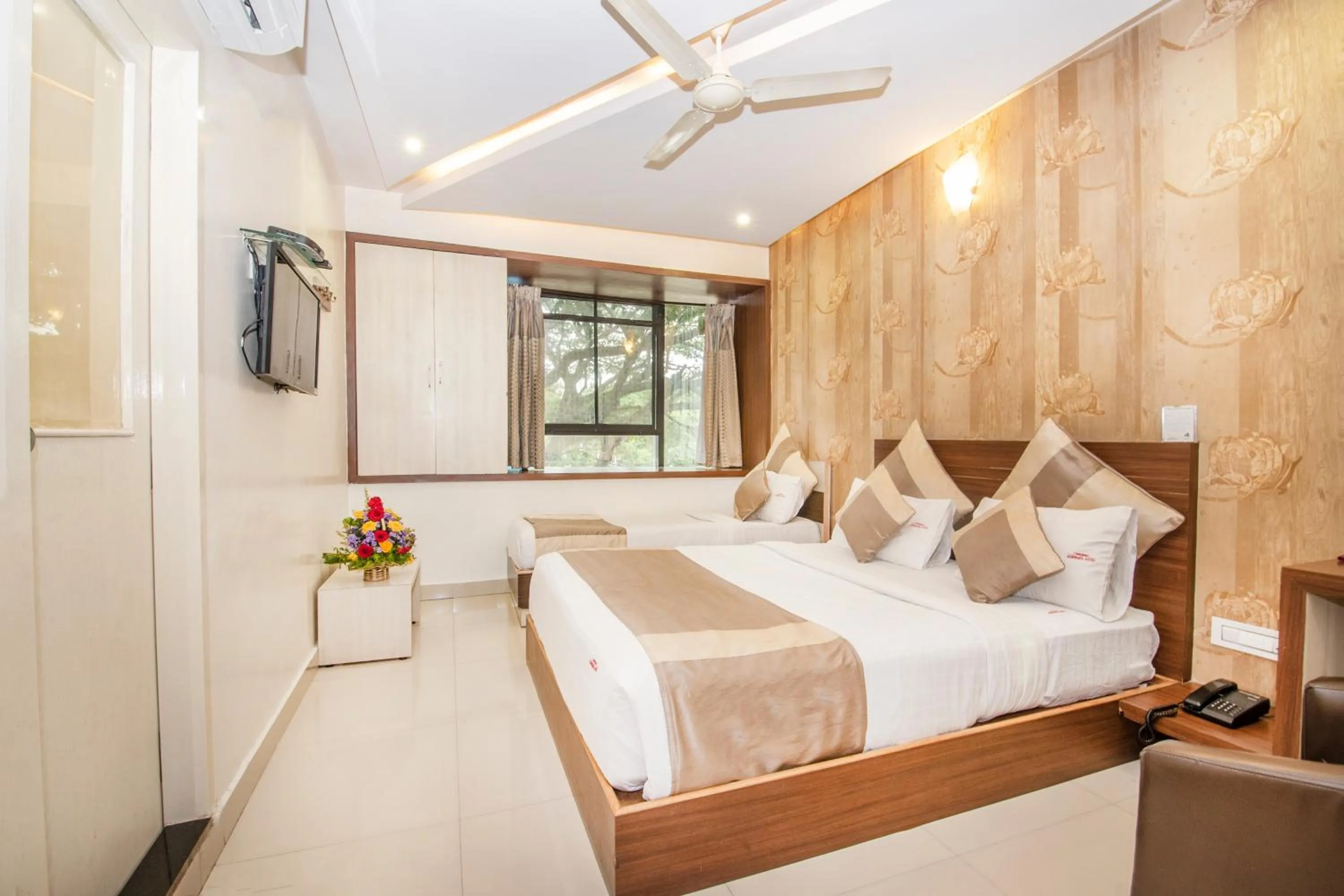 Bed in Aishwarya Suites