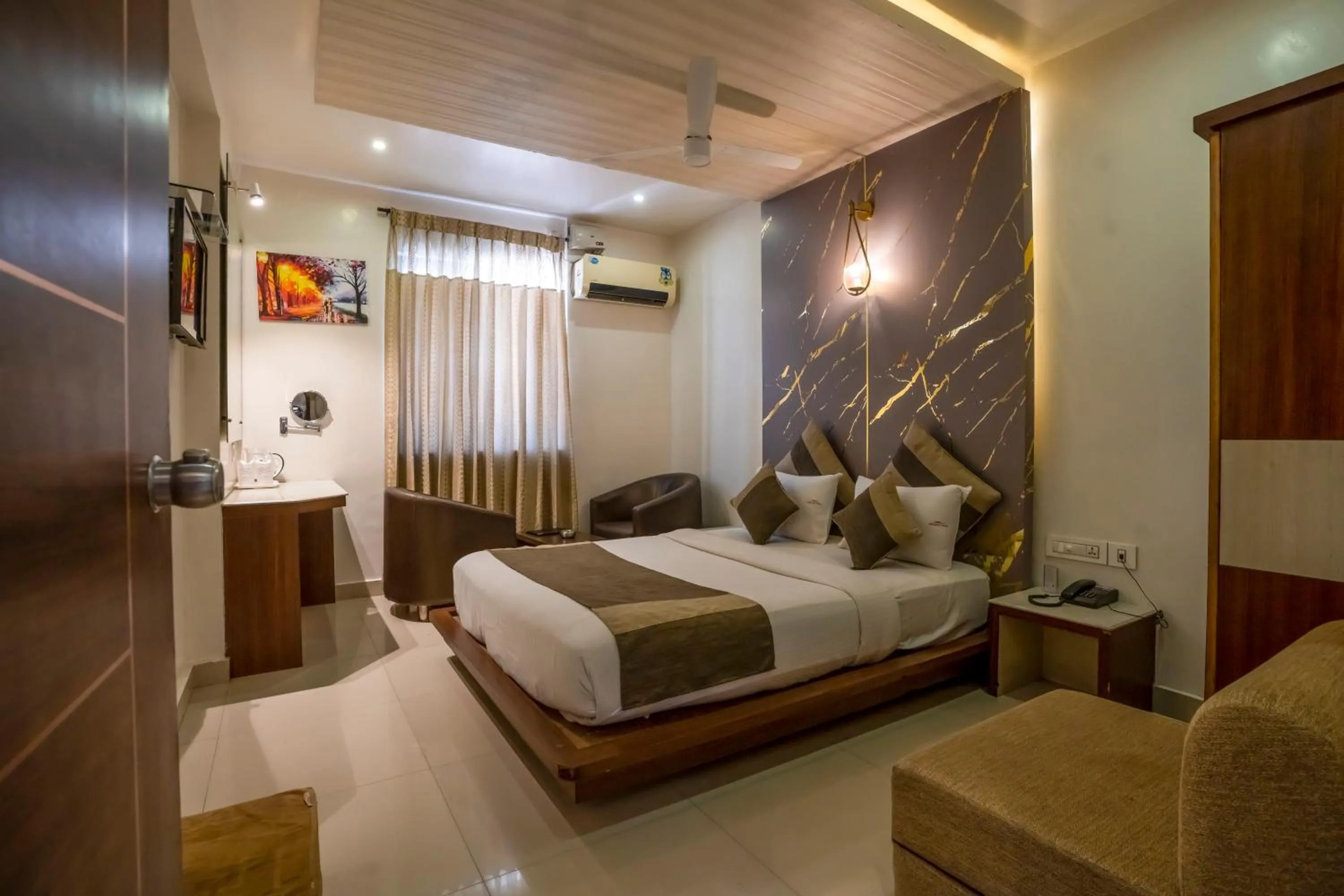 Bed in Aishwarya Suites