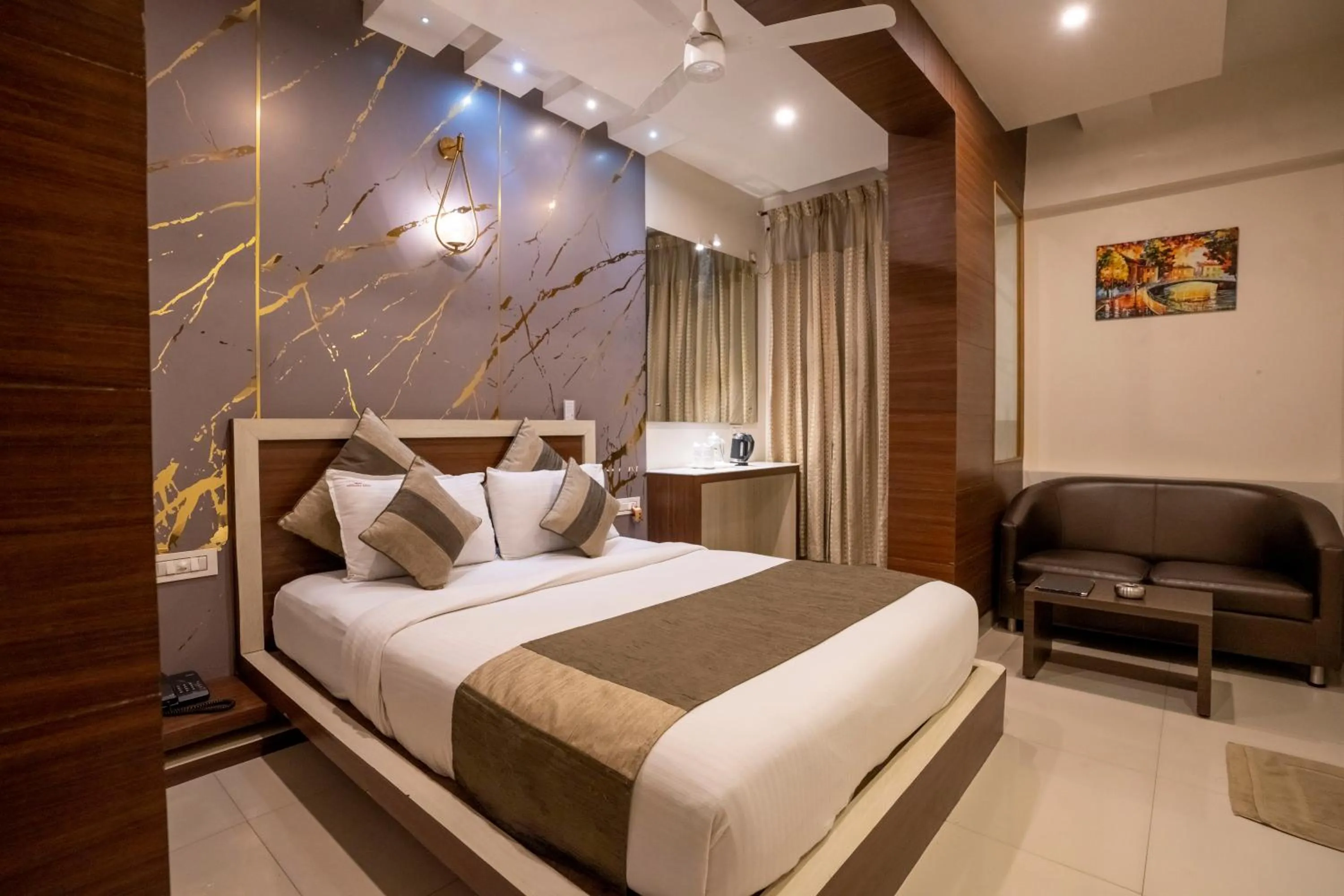 Bed in Aishwarya Suites