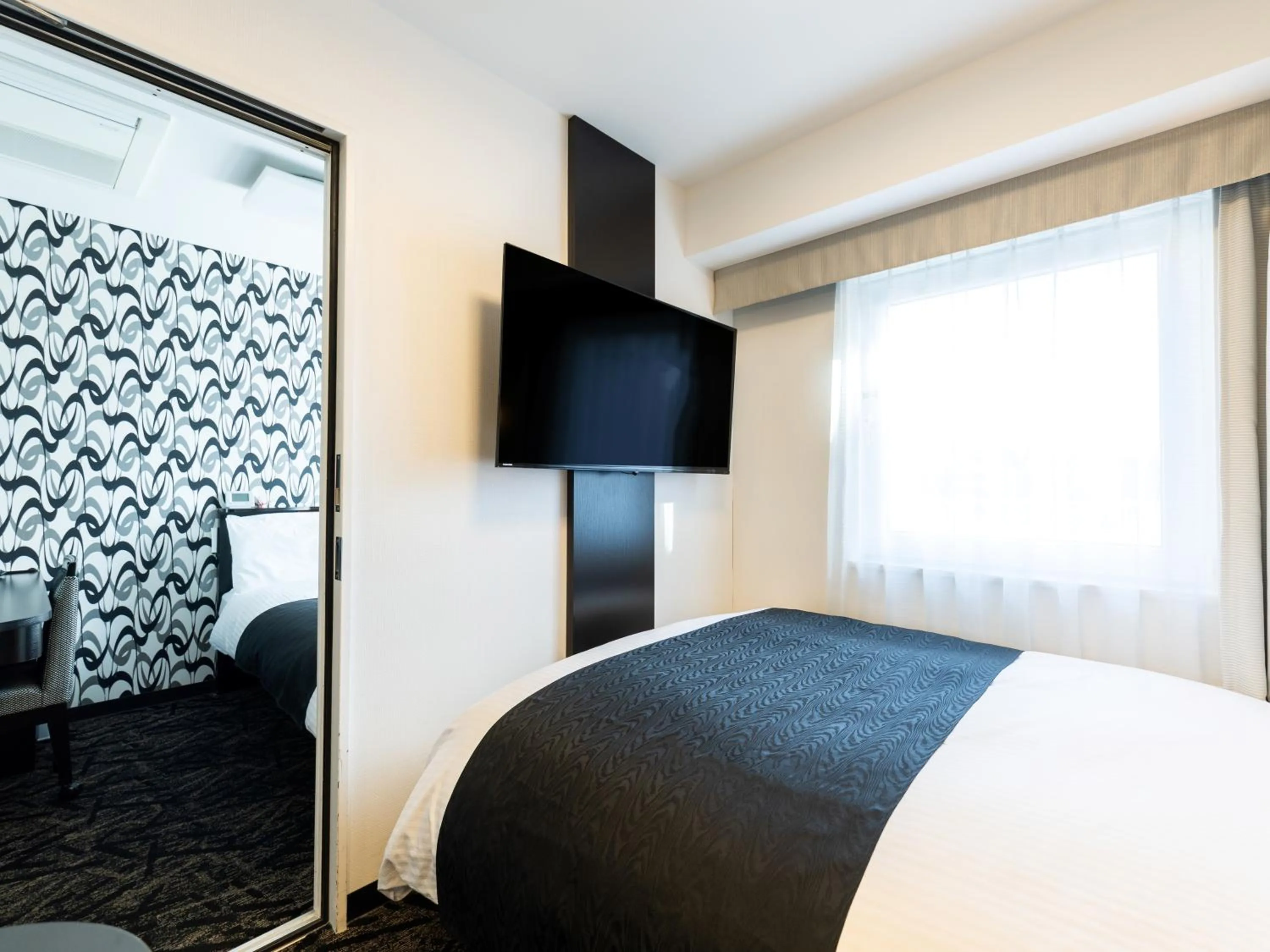 Photo of the whole room, Bed in APA Hotel Namba Shinsaibashi Higashi