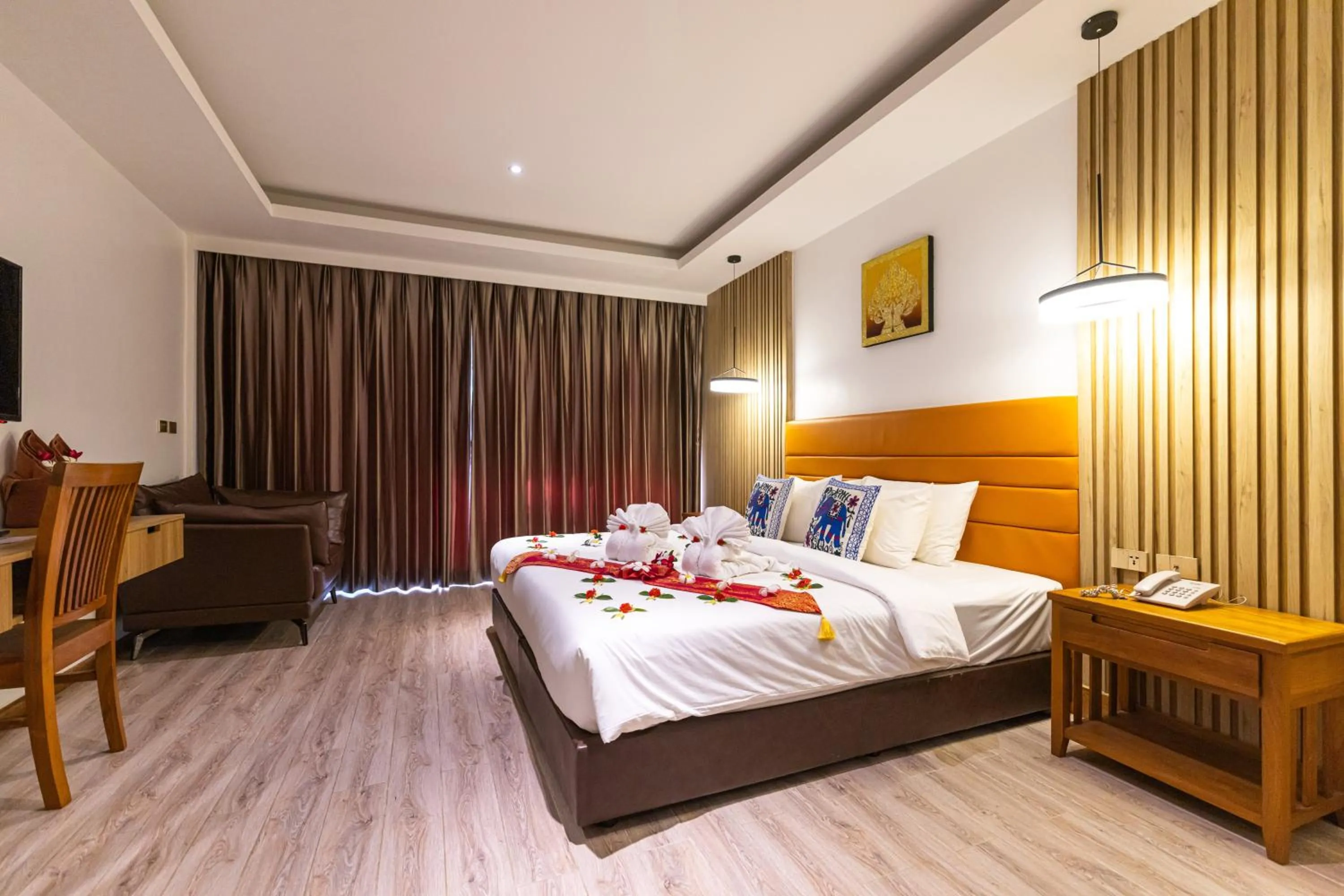 Bed in Royal Yao Yai Island Beach Resort