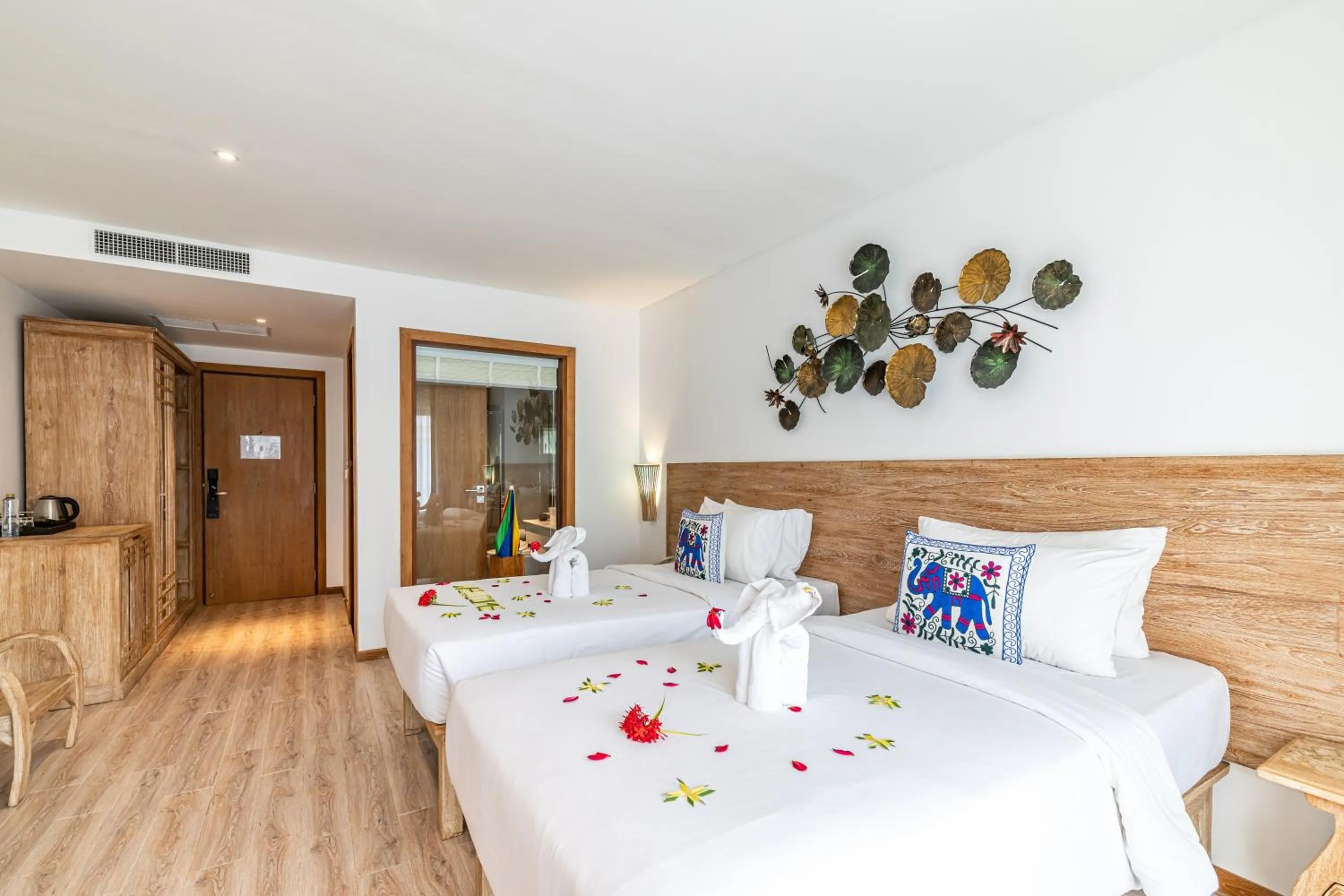 Bed in Royal Yao Yai Island Beach Resort