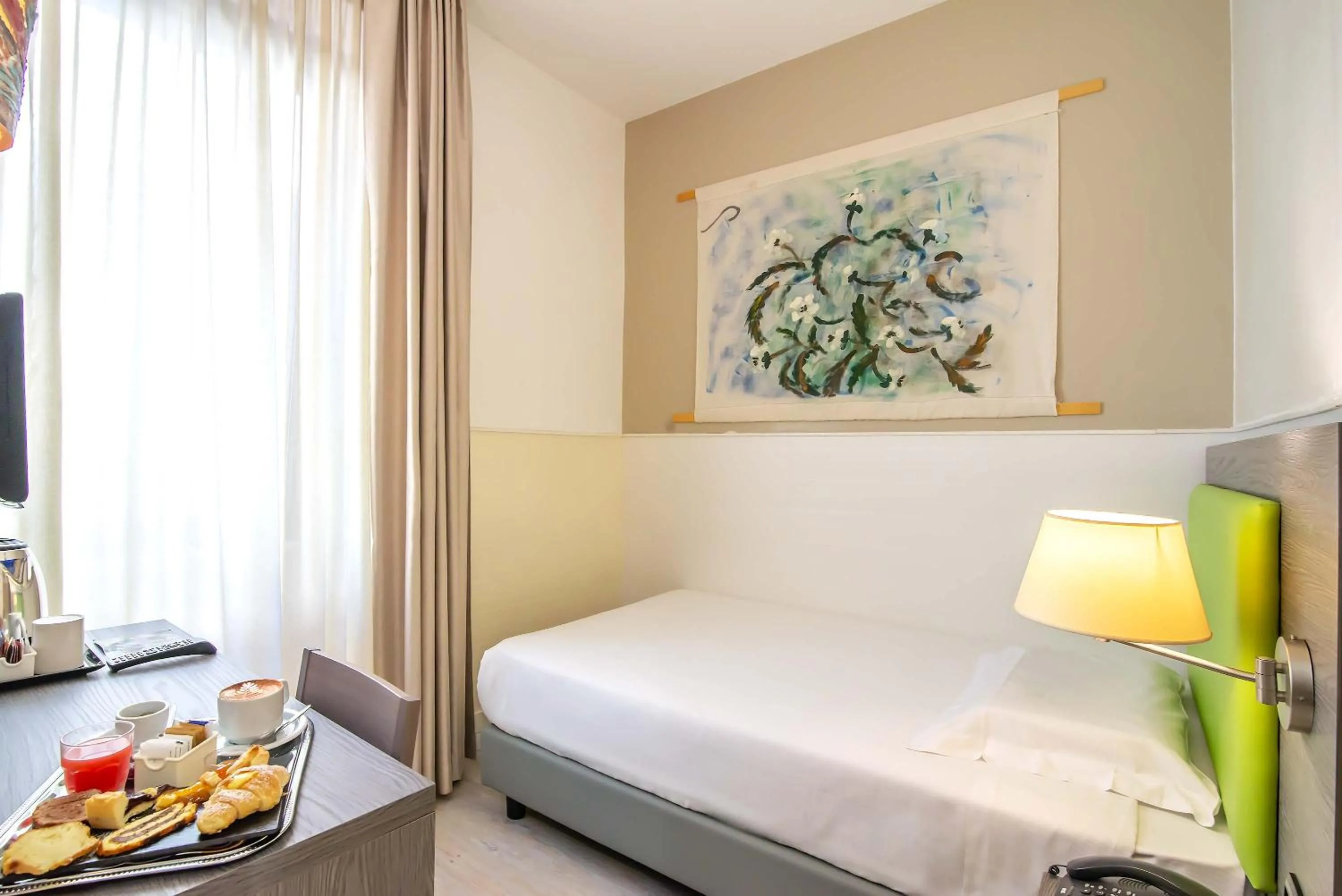 Bed in Hotel Aphrodite