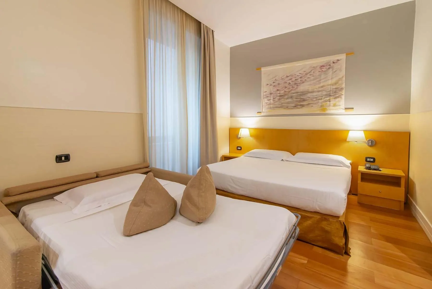 Bed in Hotel Aphrodite