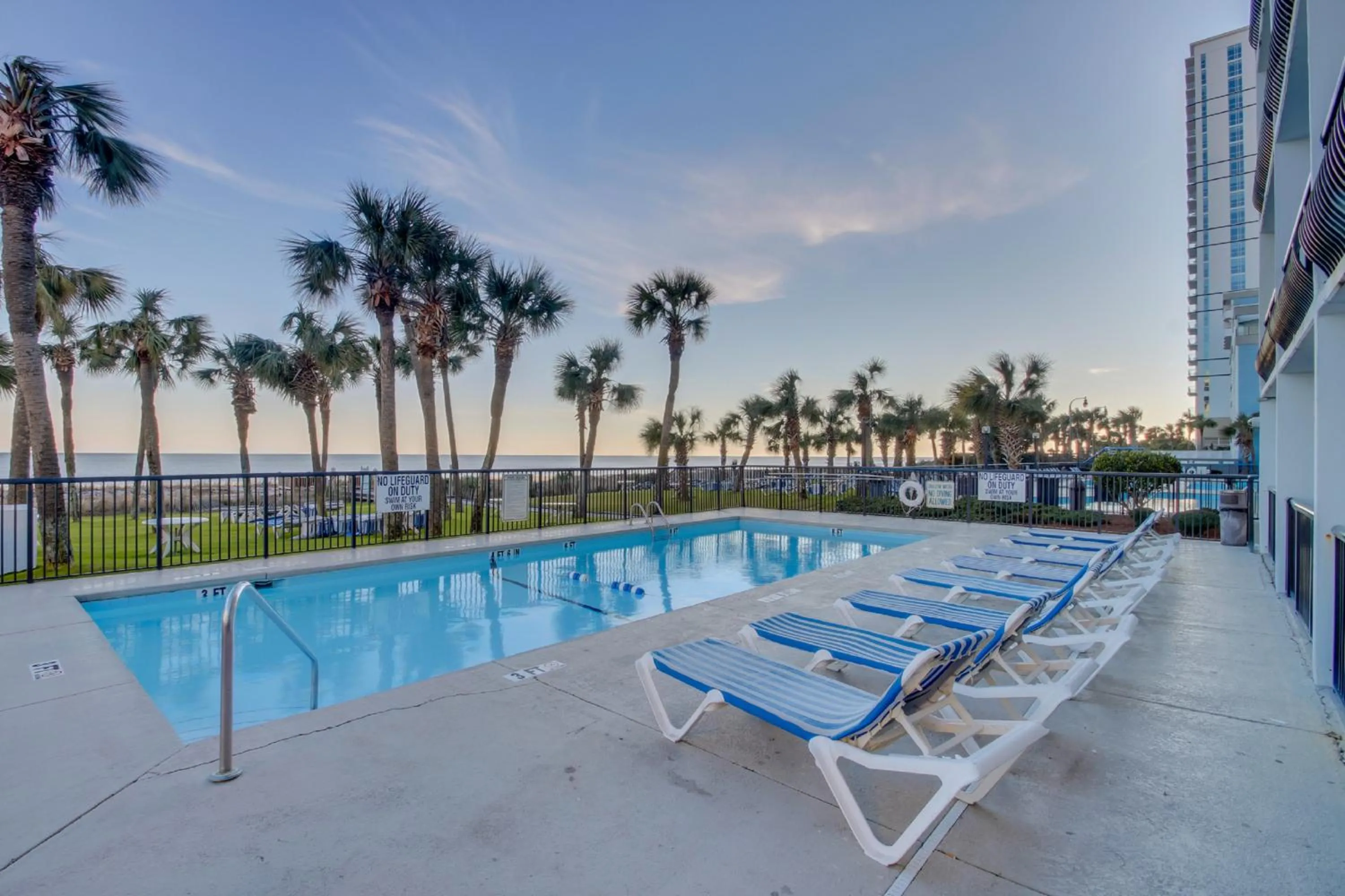 Swimming pool in Oceanfront Boardwalk Condo w Private Balcony and Beach