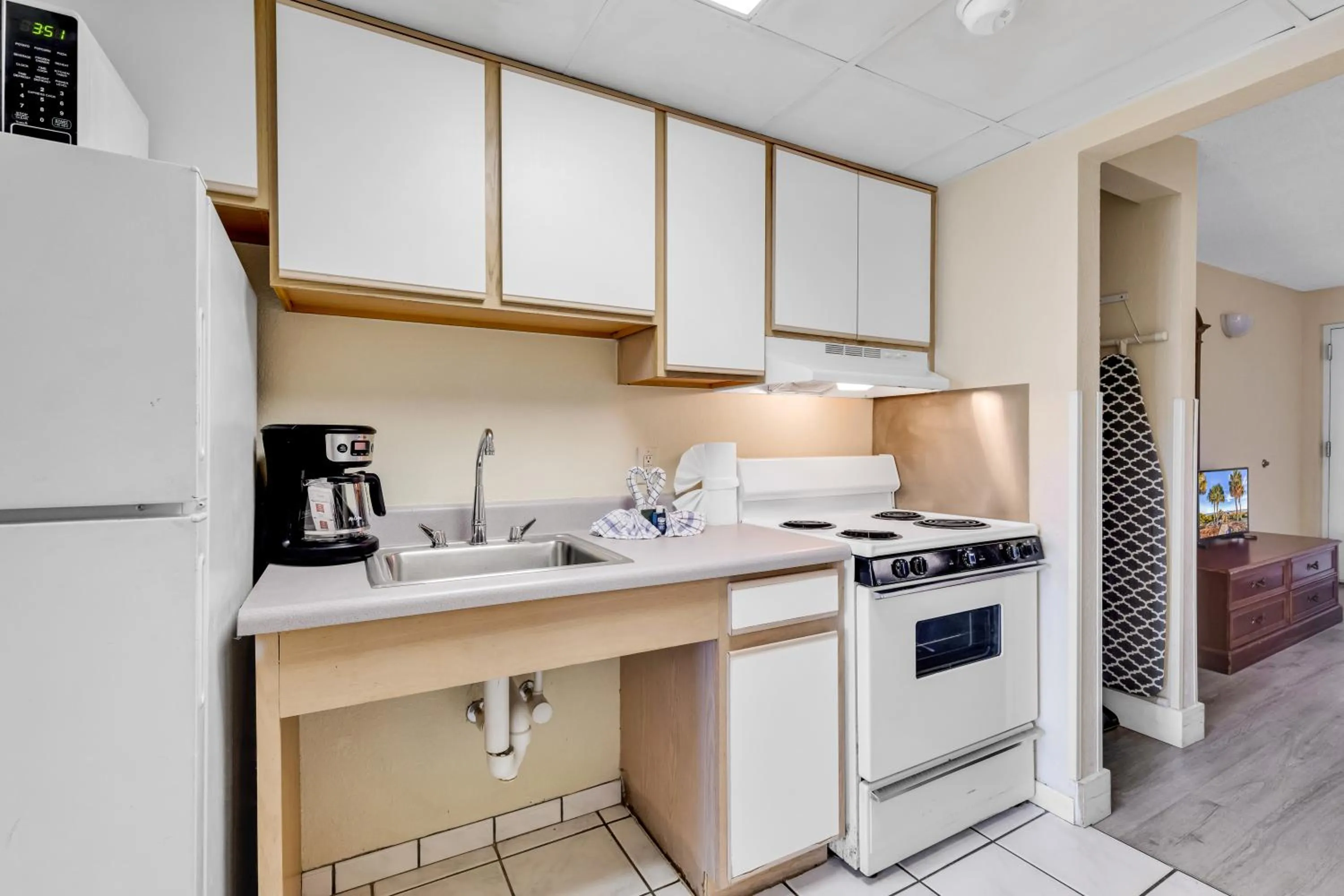 Kitchen or kitchenette in Oceanfront Boardwalk Condo w Private Balcony and Beach