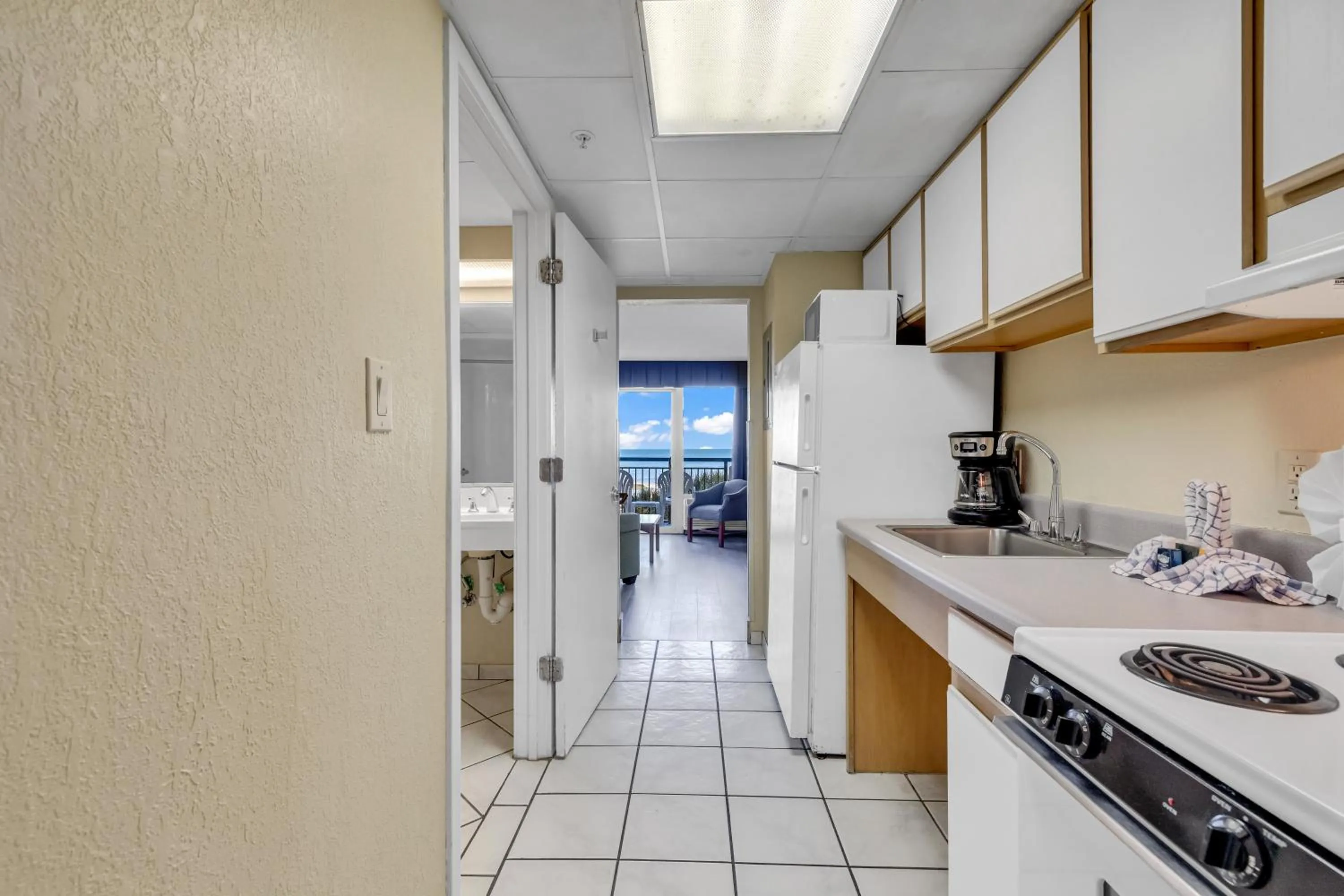 Kitchen or kitchenette in Oceanfront Boardwalk Condo w Private Balcony and Beach