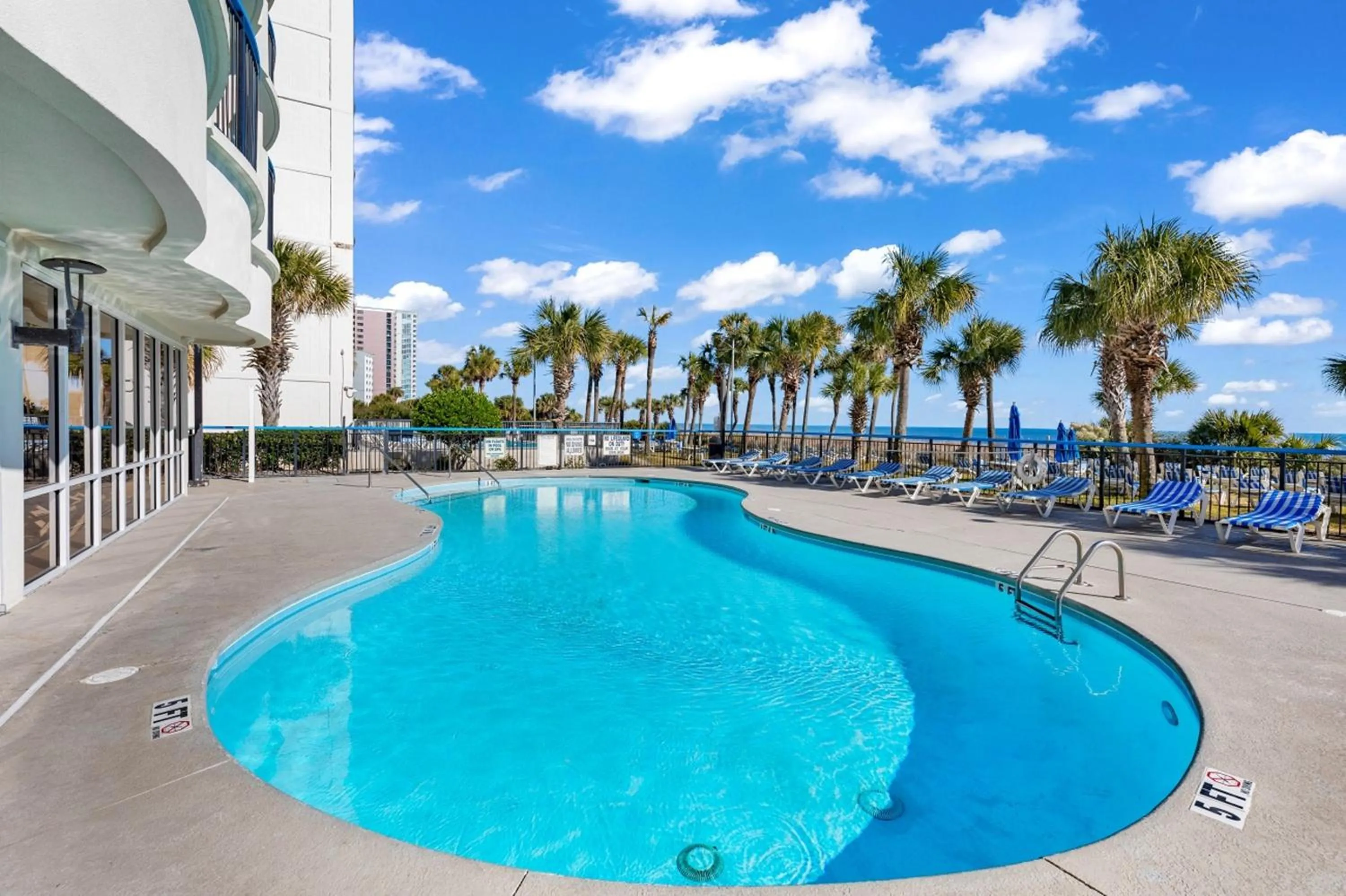 Swimming pool in Oceanfront Boardwalk Condo w Private Balcony and Beach