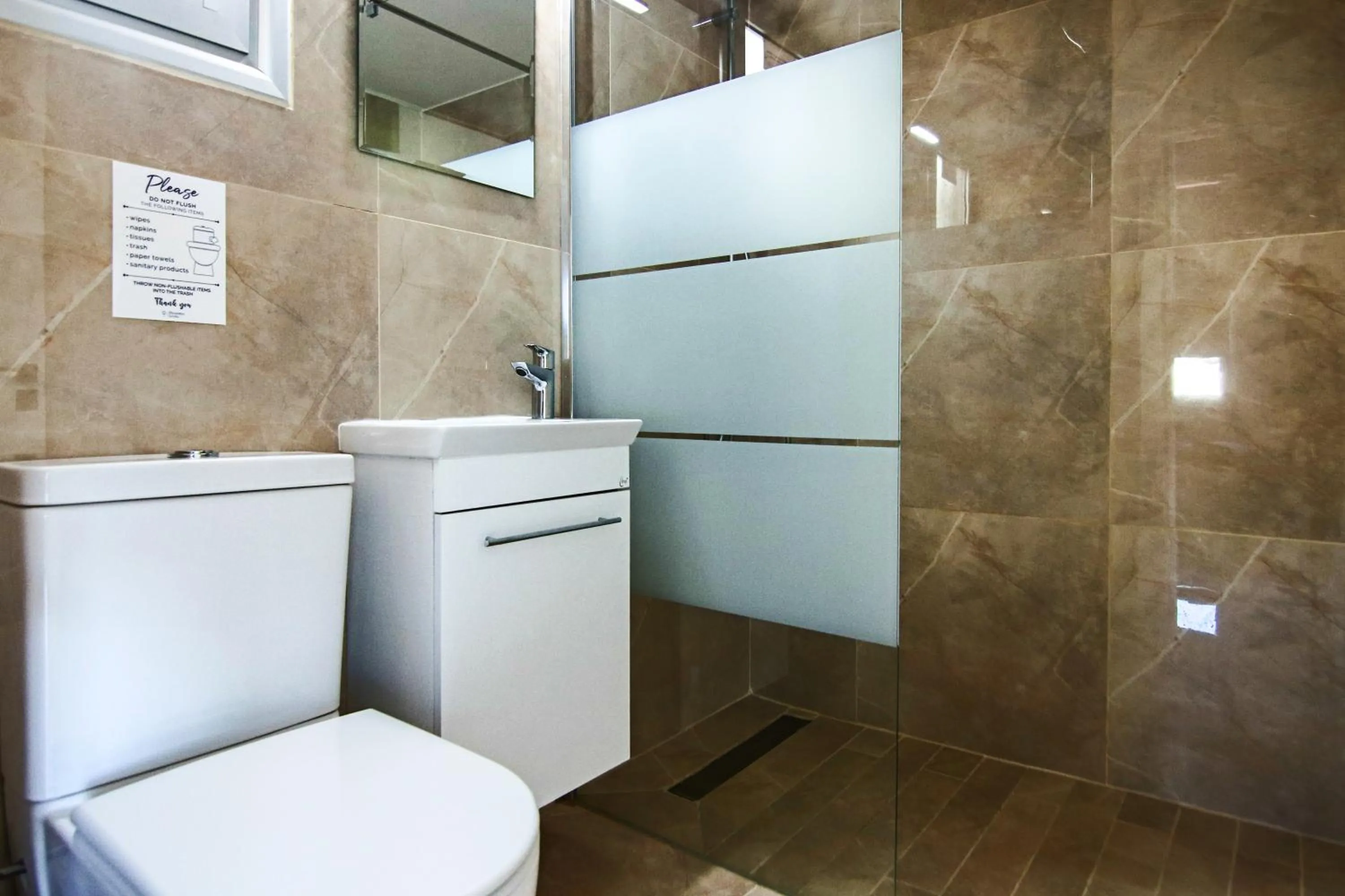 Shower in Phaedrus Living Seaside Residence Lighthouse 70