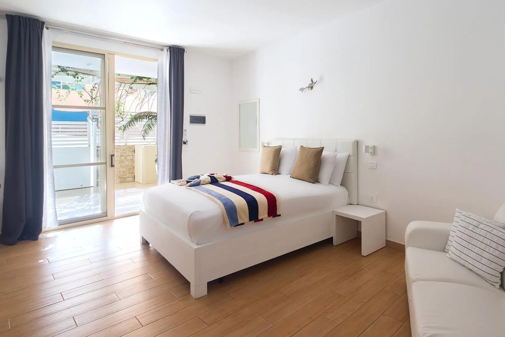 Photo of the whole room in Branco Suites - Rooms & Holiday Apartments