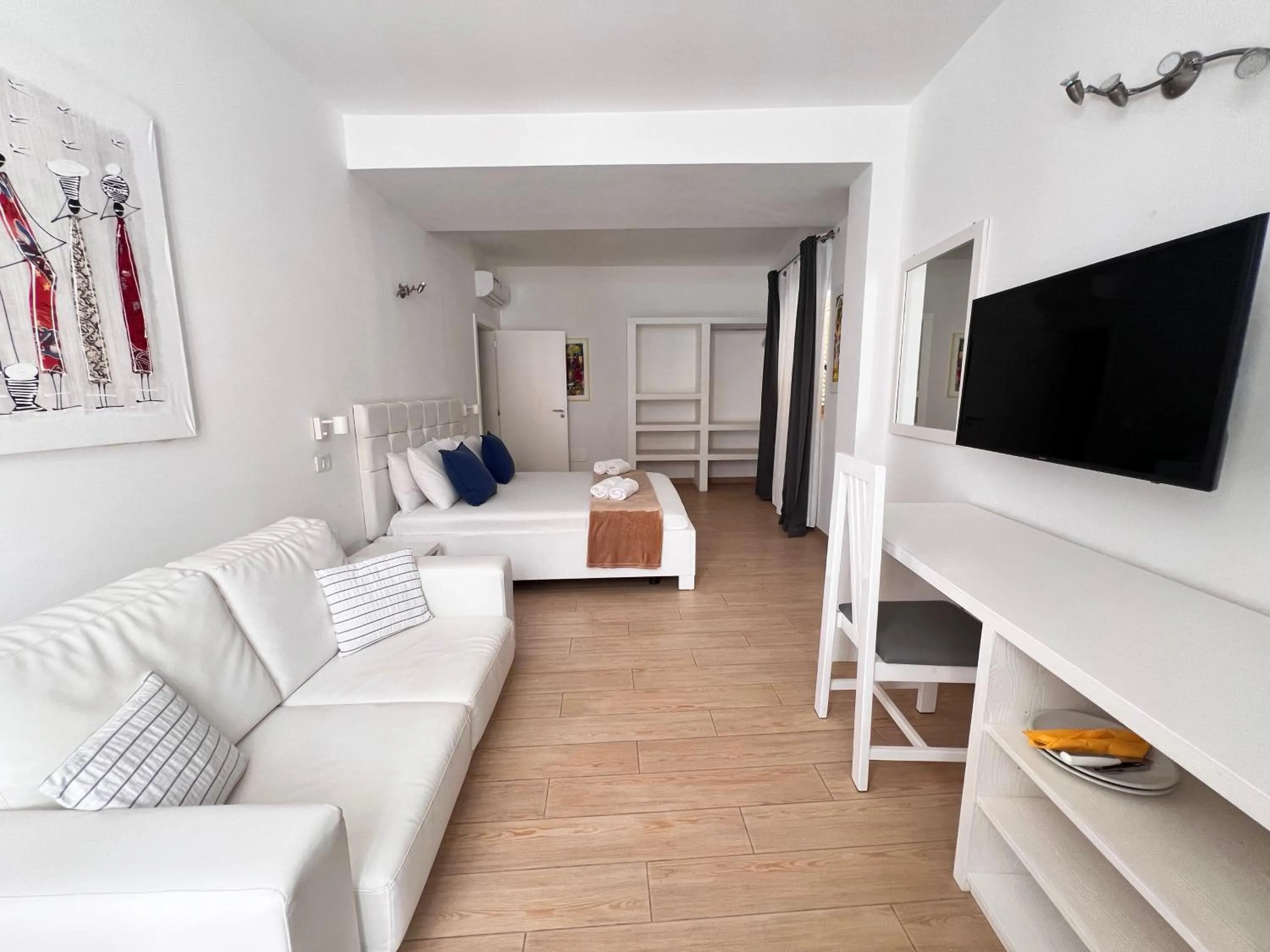 Photo of the whole room in Branco Suites - Rooms & Holiday Apartments