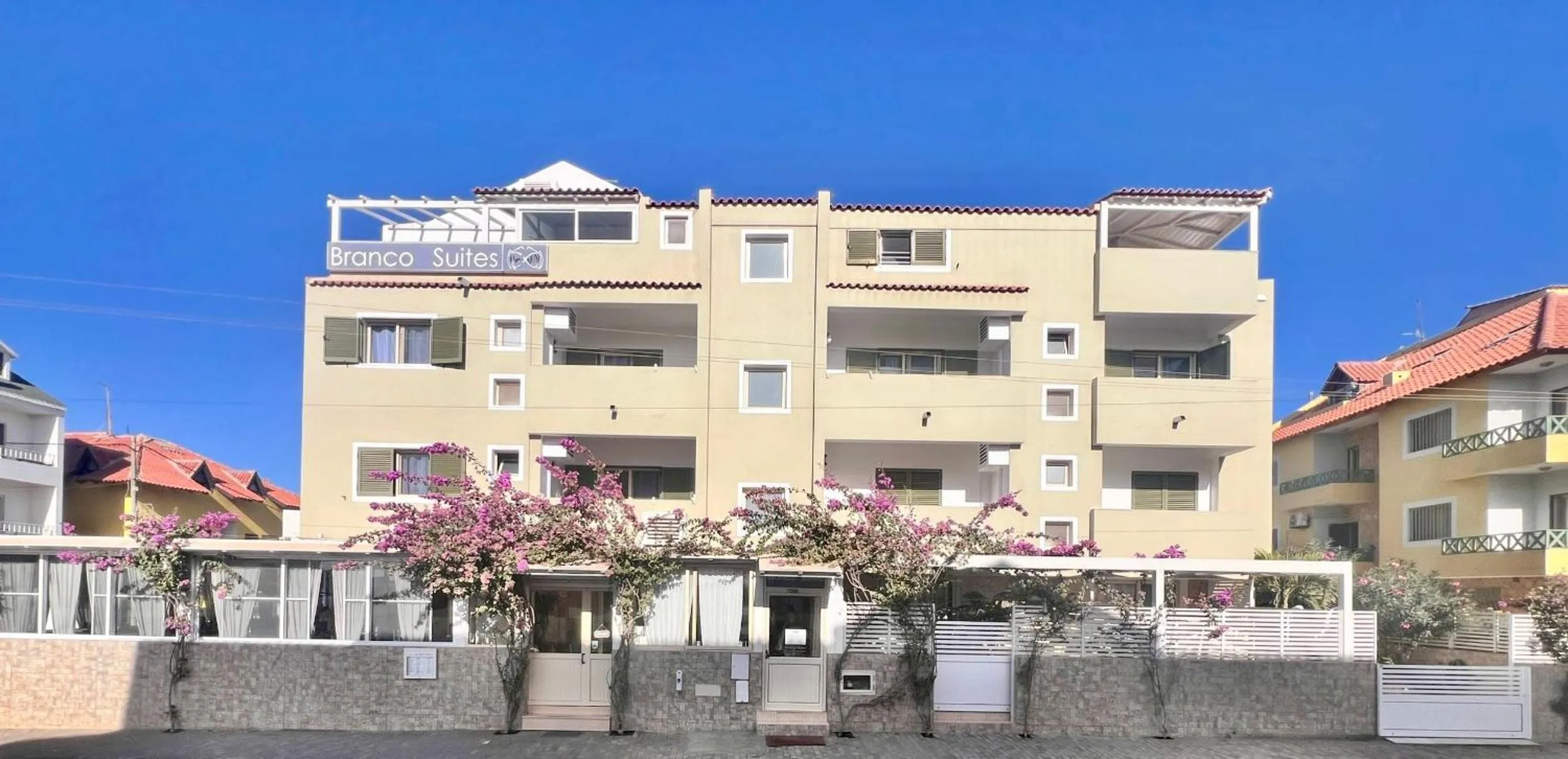 Property building in Branco Suites - Rooms & Holiday Apartments