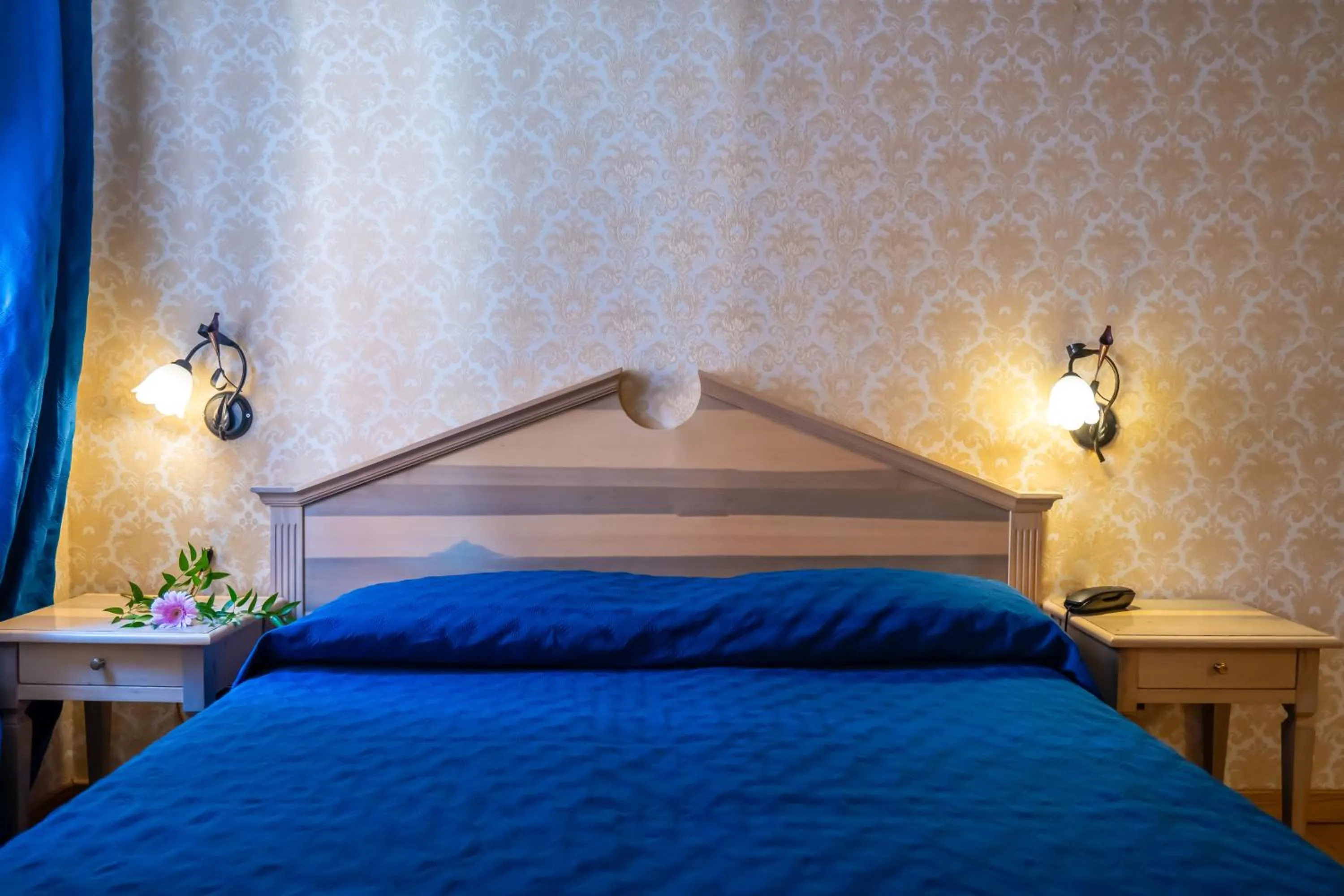 Bed in Hotel Tintoretto