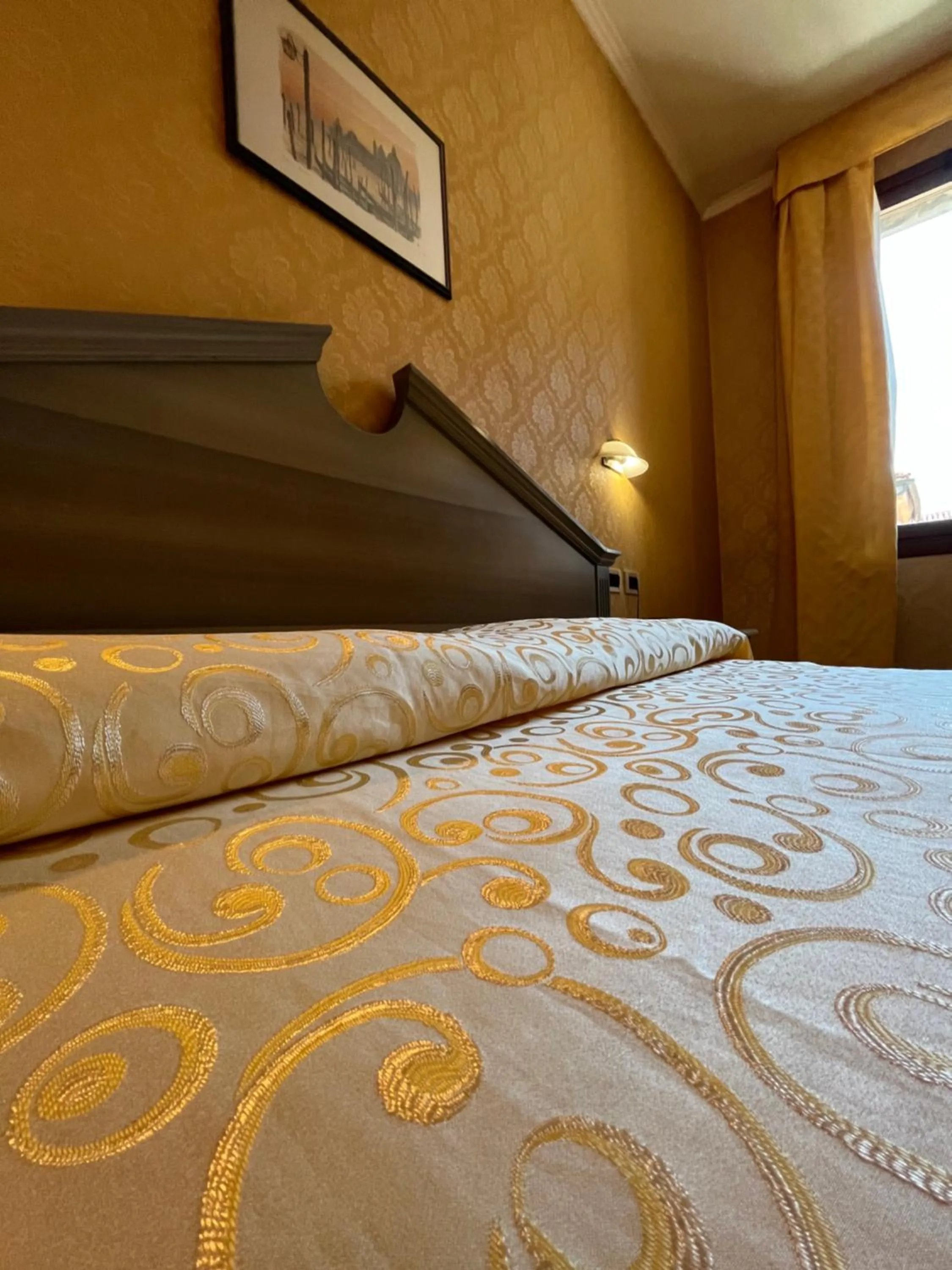 Bed in Hotel Tintoretto