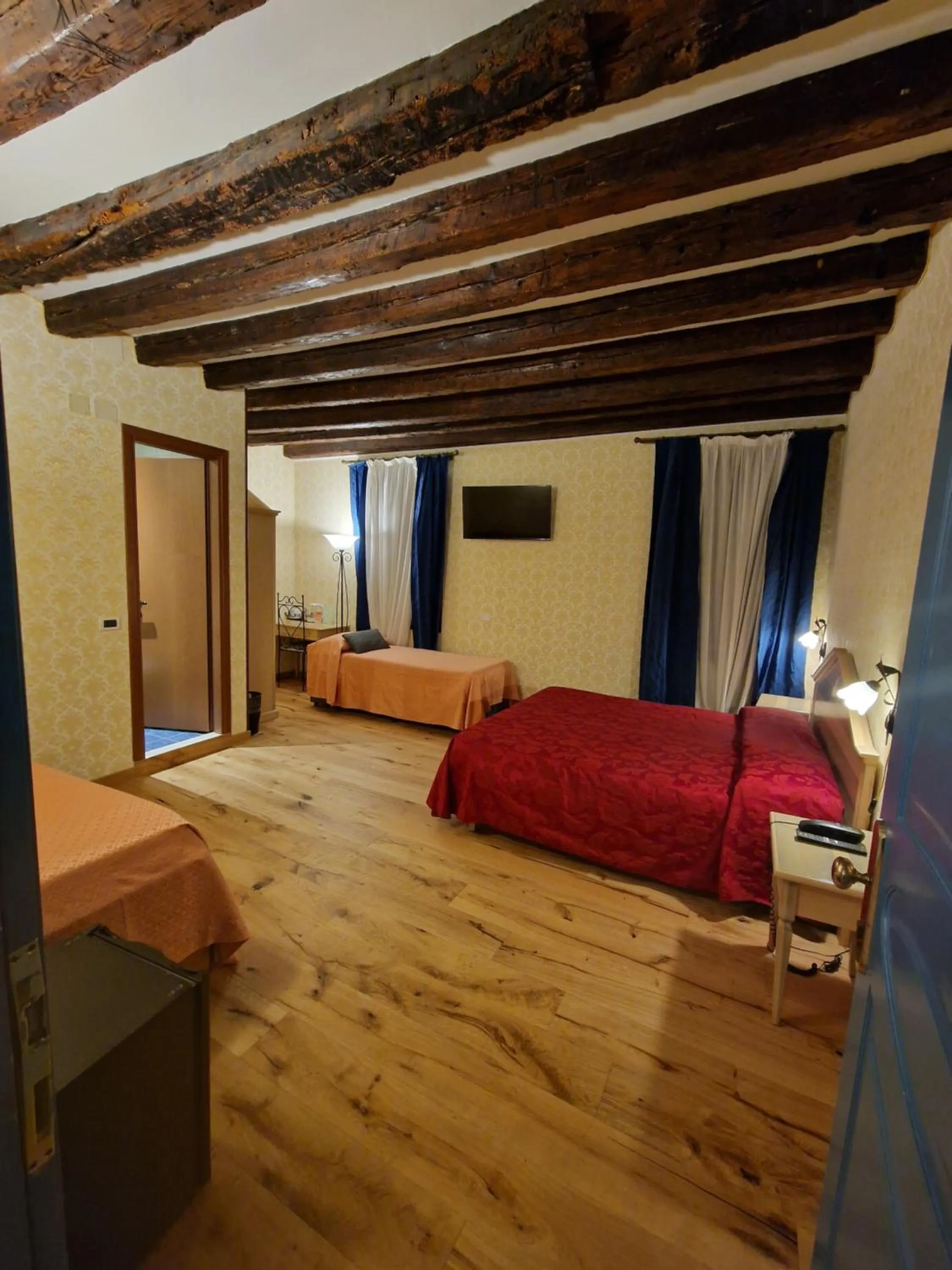 Bed in Hotel Tintoretto