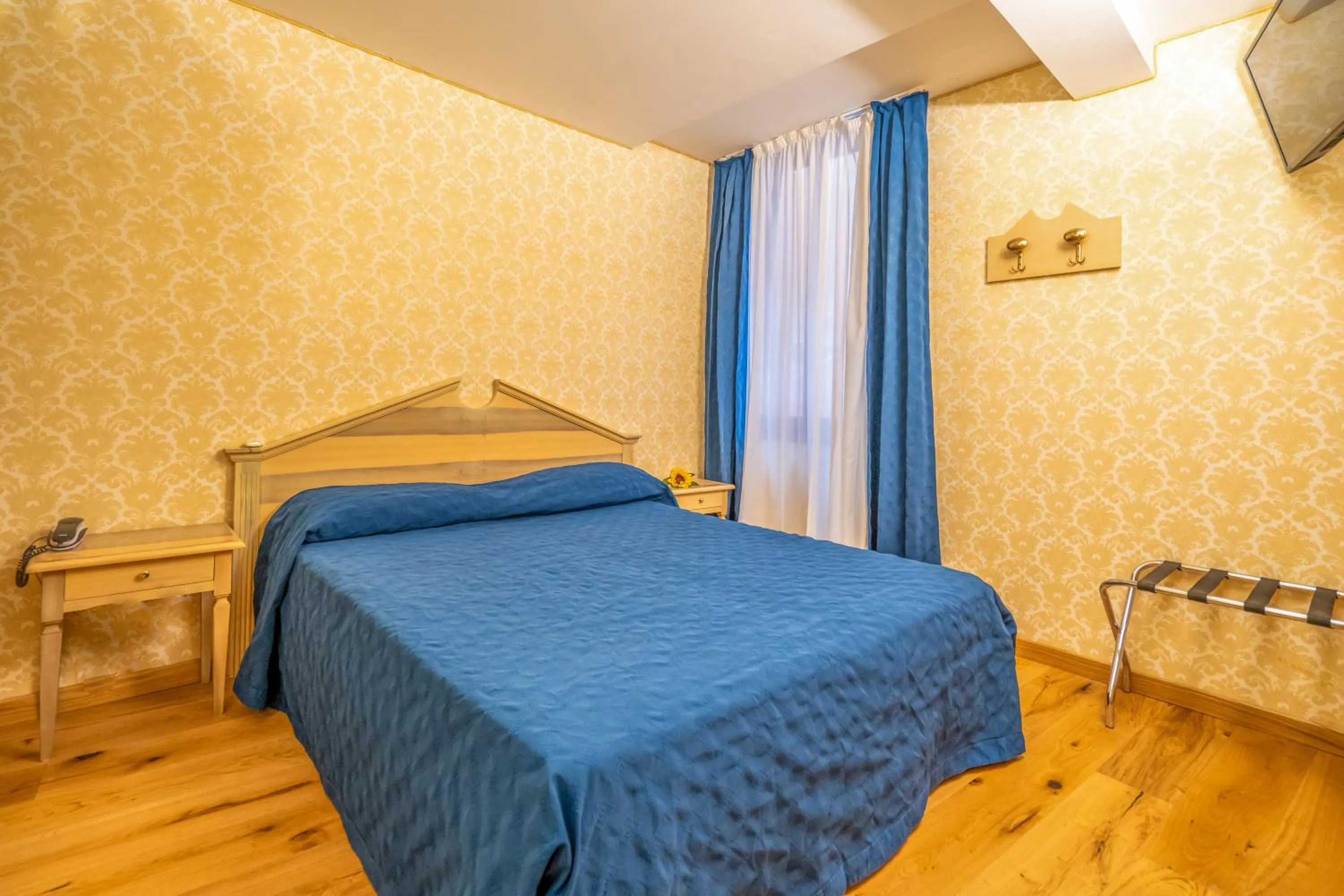 Bed in Hotel Tintoretto