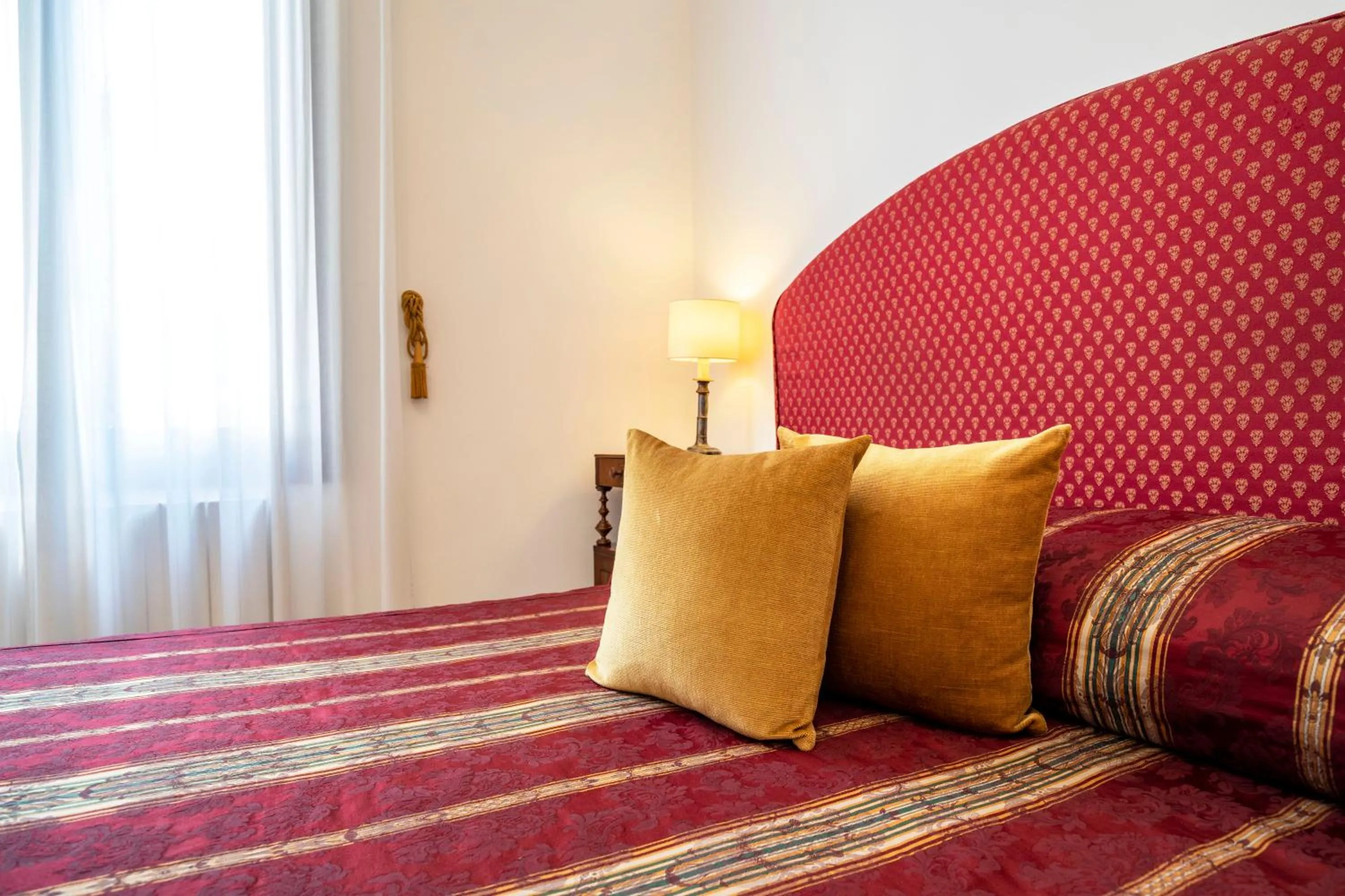 Bed in Palazzo Schiavoni Residenza d'epoca & Suite-Apartments