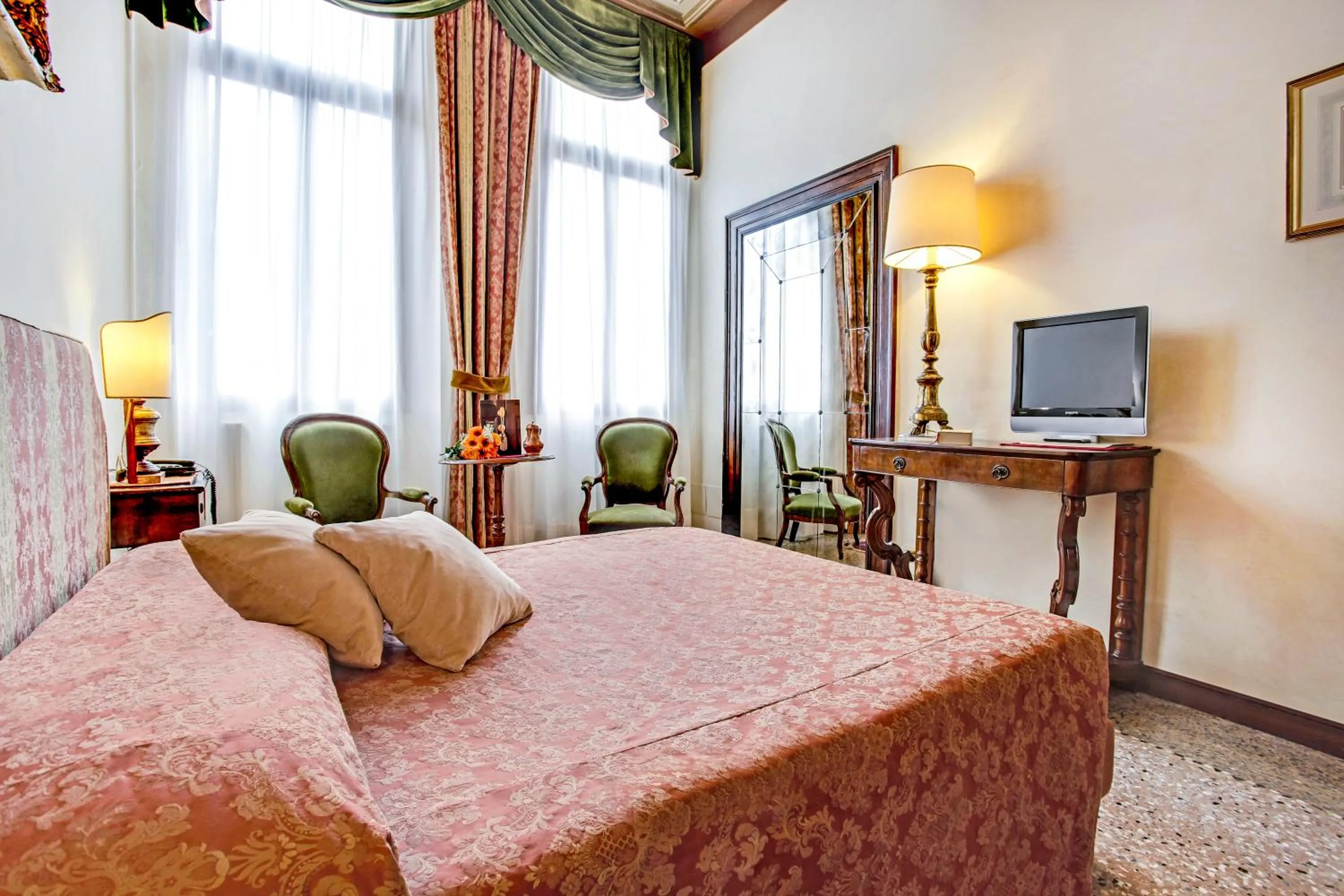 Bed in Palazzo Schiavoni Residenza d'epoca & Suite-Apartments