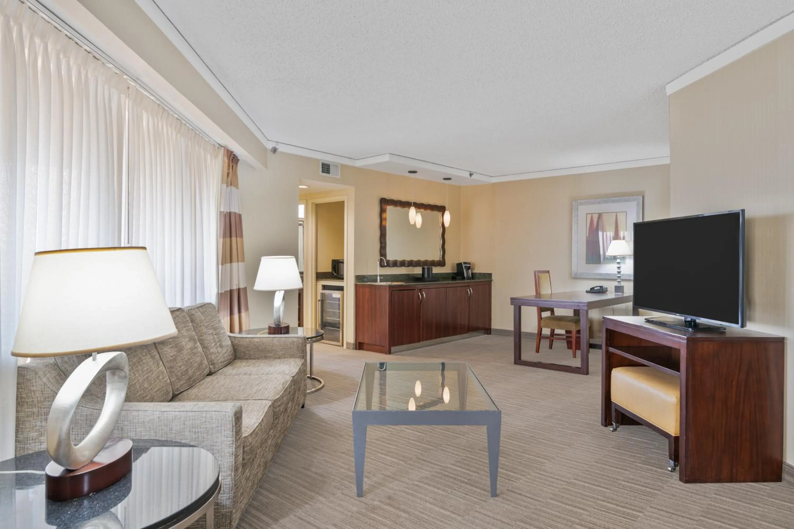 Living room in Harmony Suites Secaucus Meadowlands