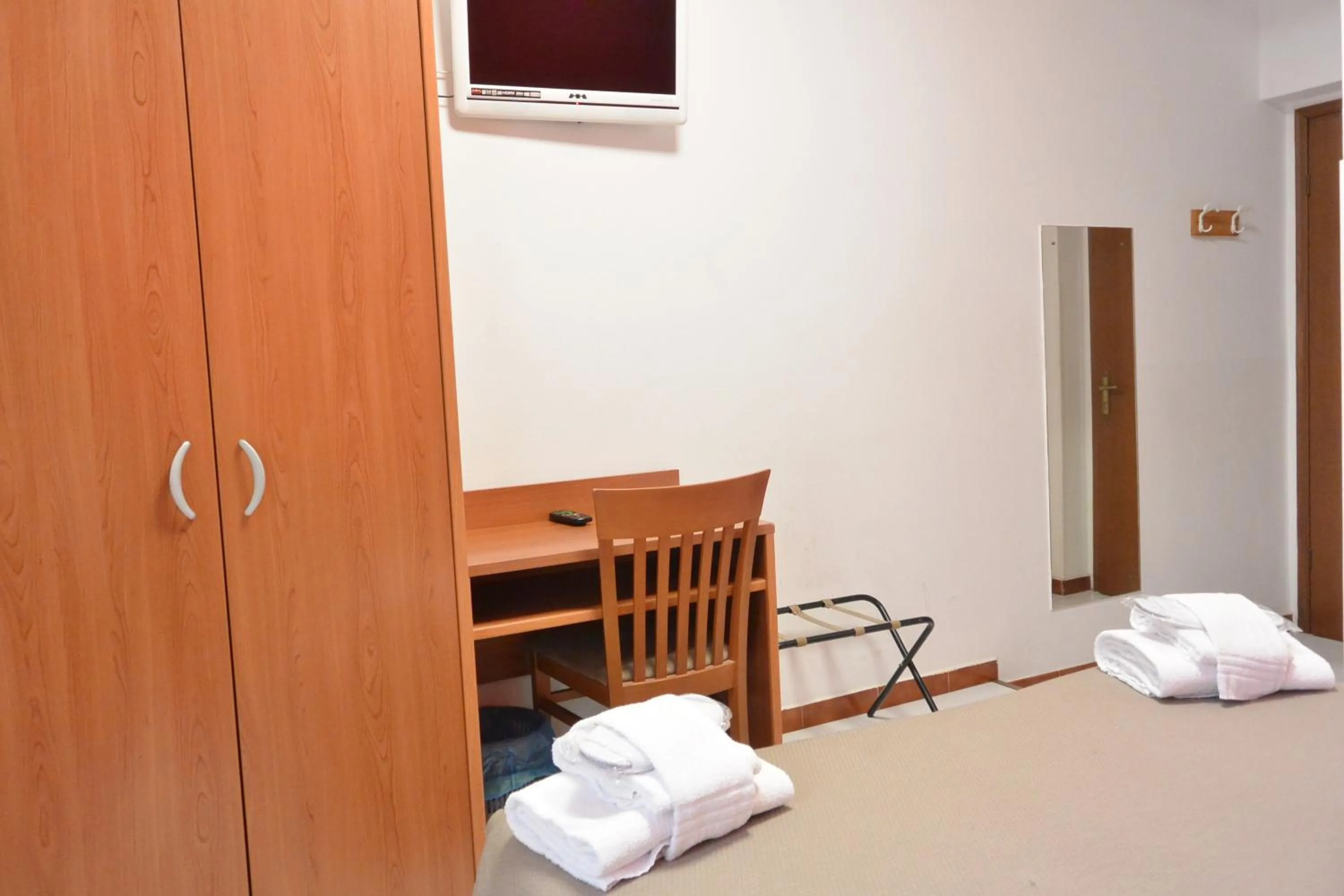 Seating area, Bed in Hotel Trentina