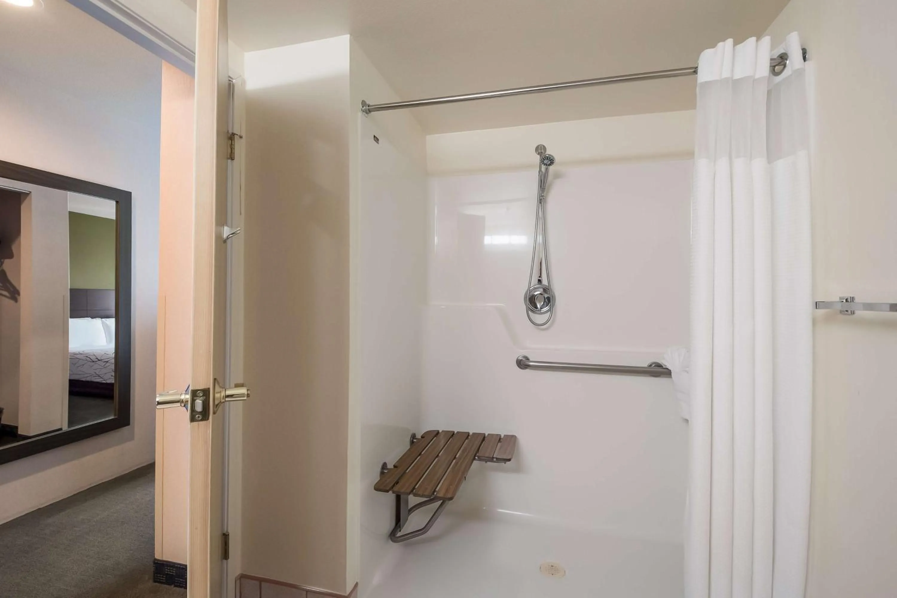 Bathroom in SureStay Plus Hotel by Best Western SeaTac Airport