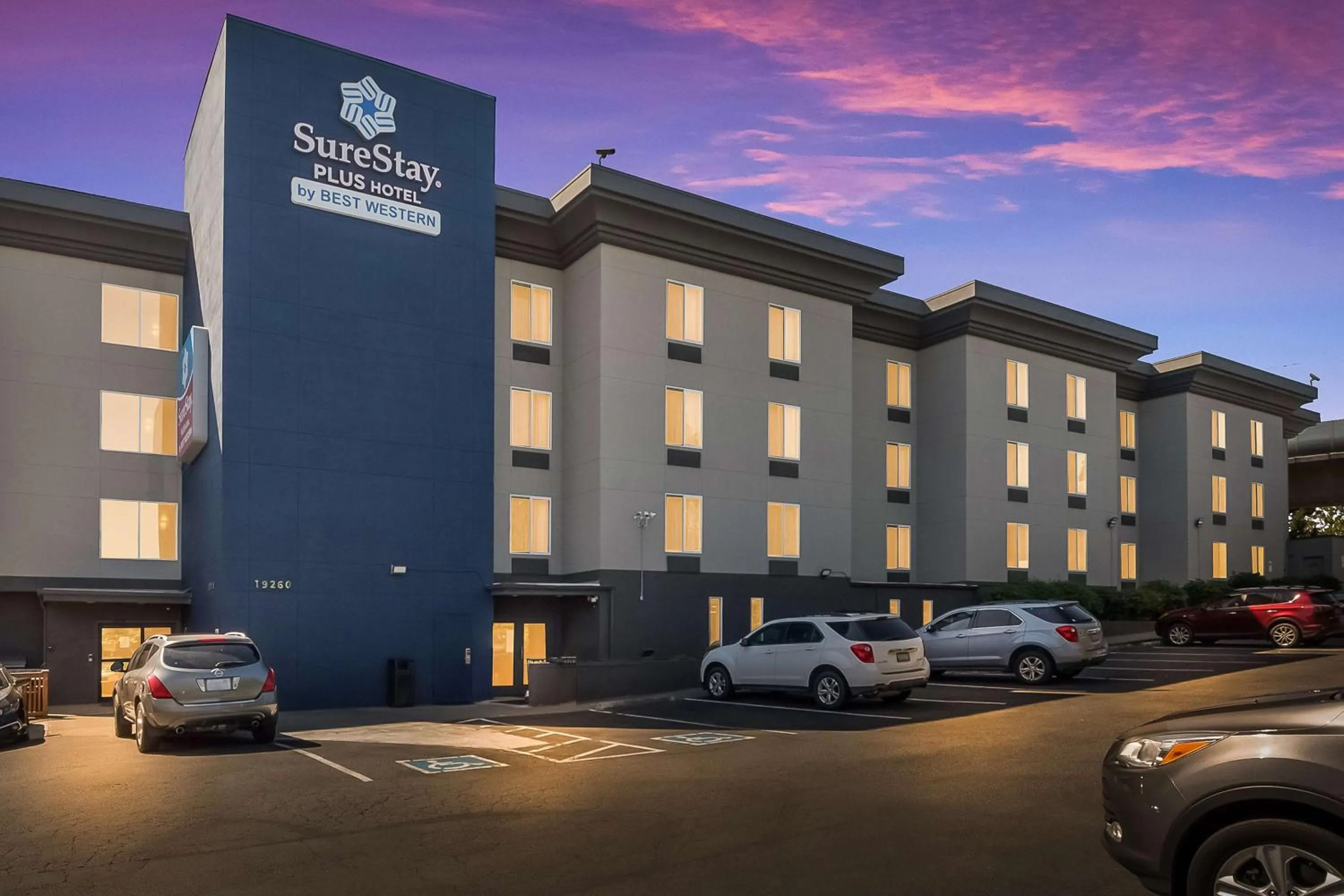 Property building in SureStay Plus Hotel by Best Western SeaTac Airport