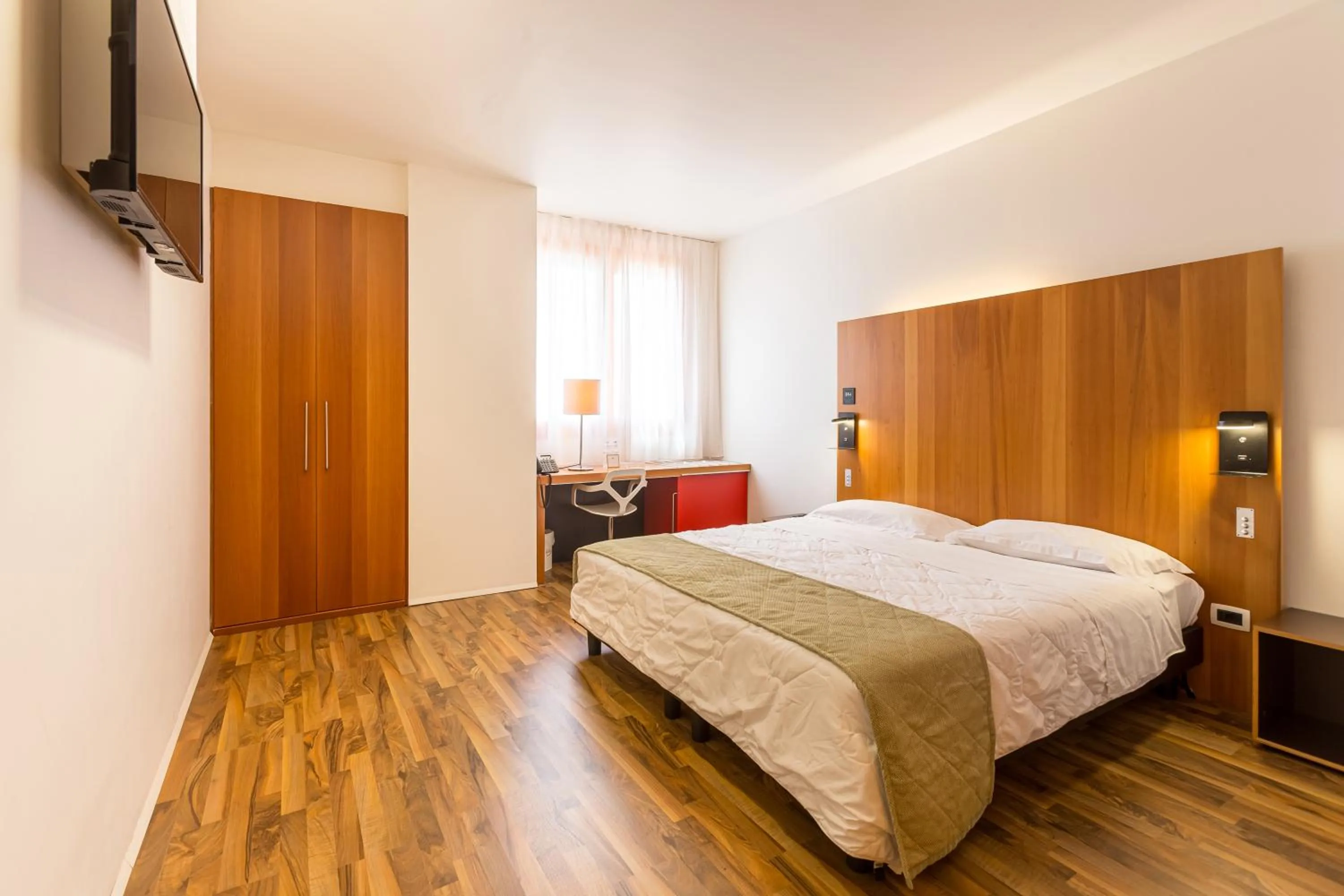 Bed in NEW IPOINT HOTEL