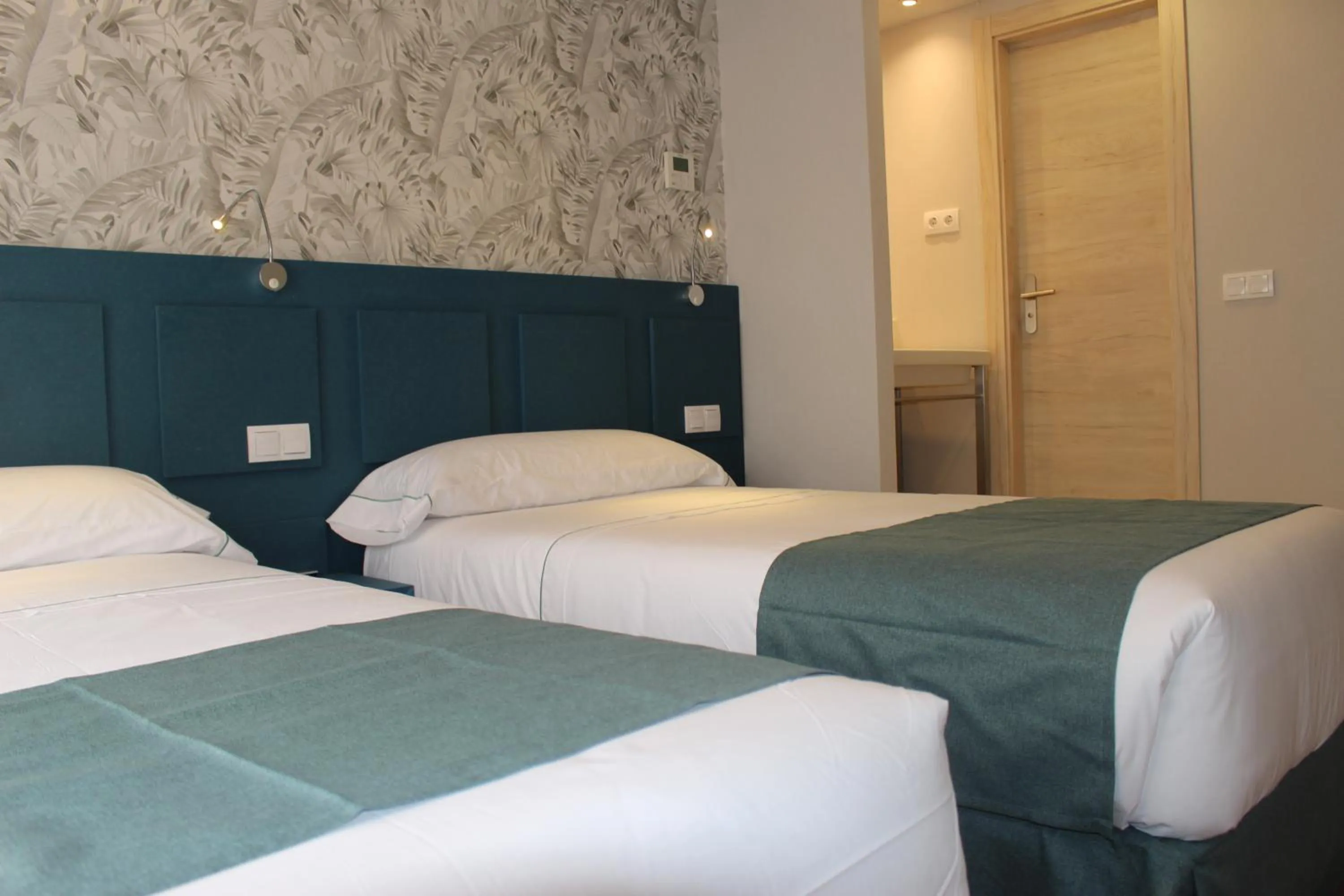 Bed in Modo Hotel Apartamento