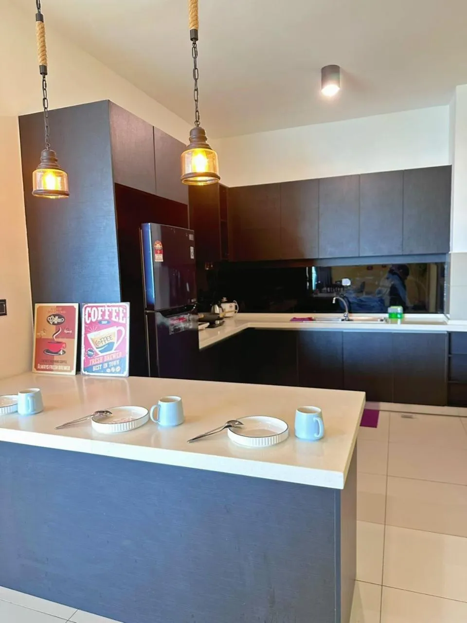 Kitchen or kitchenette in Mari Mari Homestay - IMAGO THE LOFT