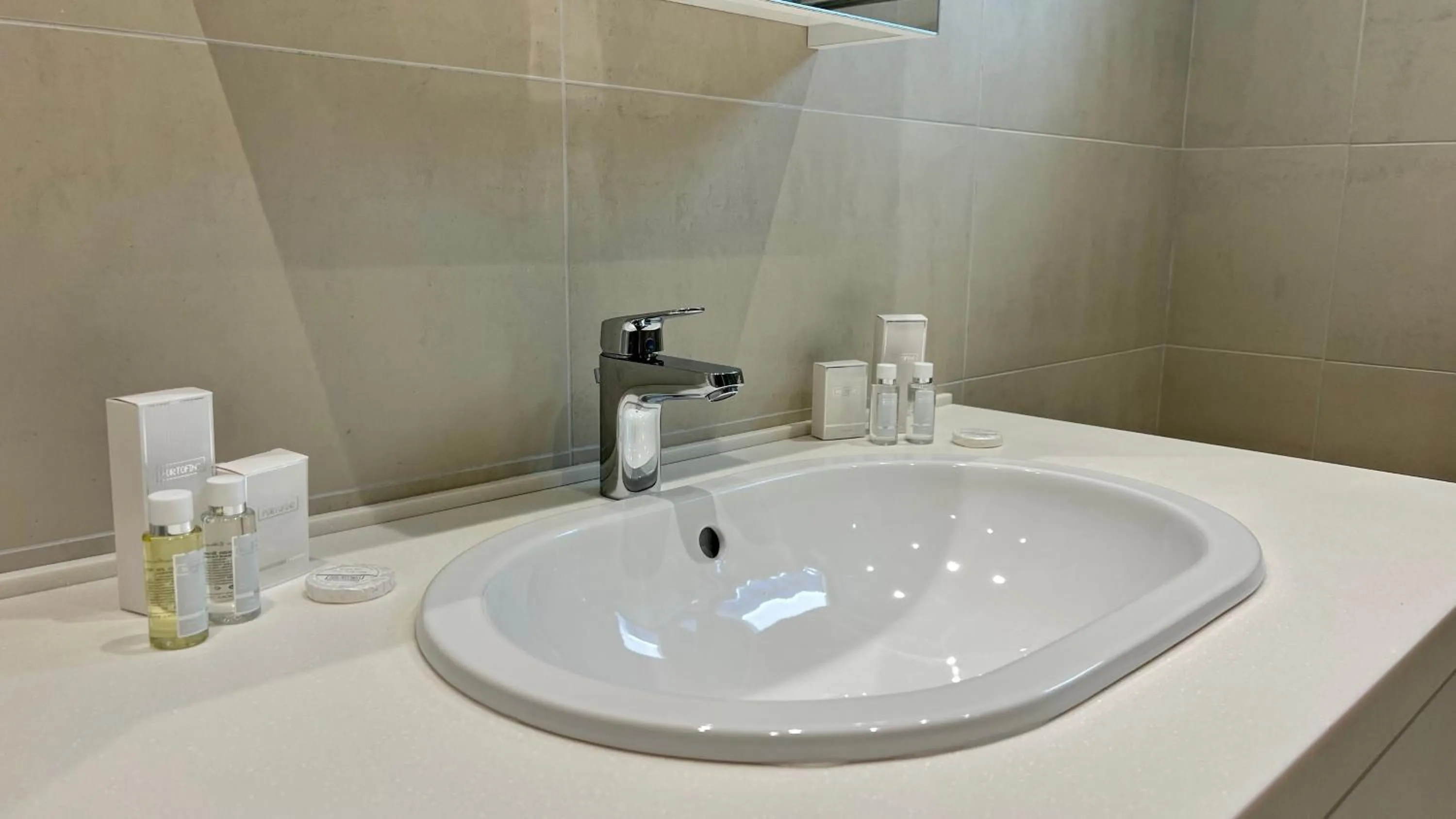 Bathroom in Sunraf Luxe Apartments