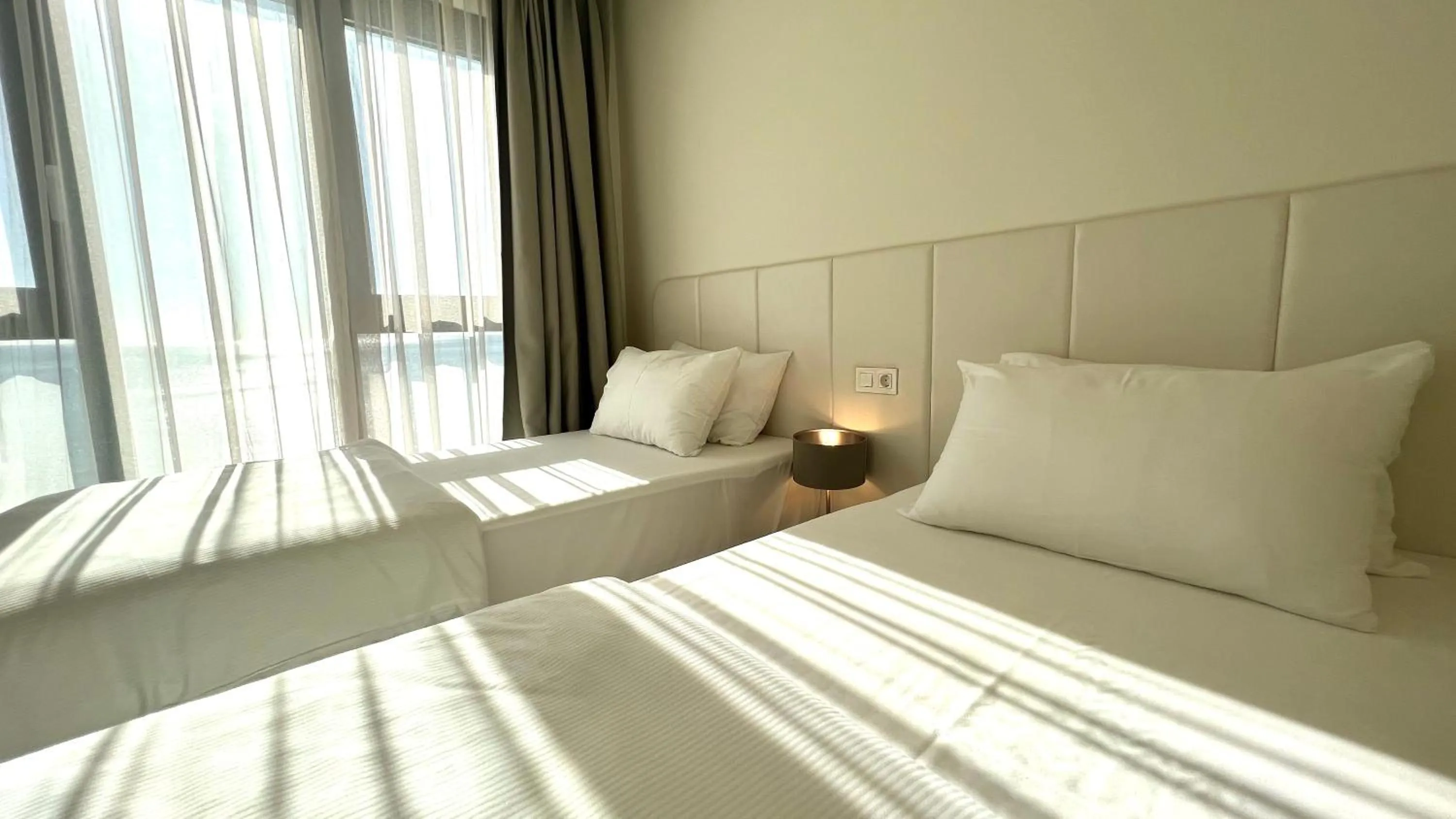 Bedroom, Bed in Sunraf Luxe Apartments