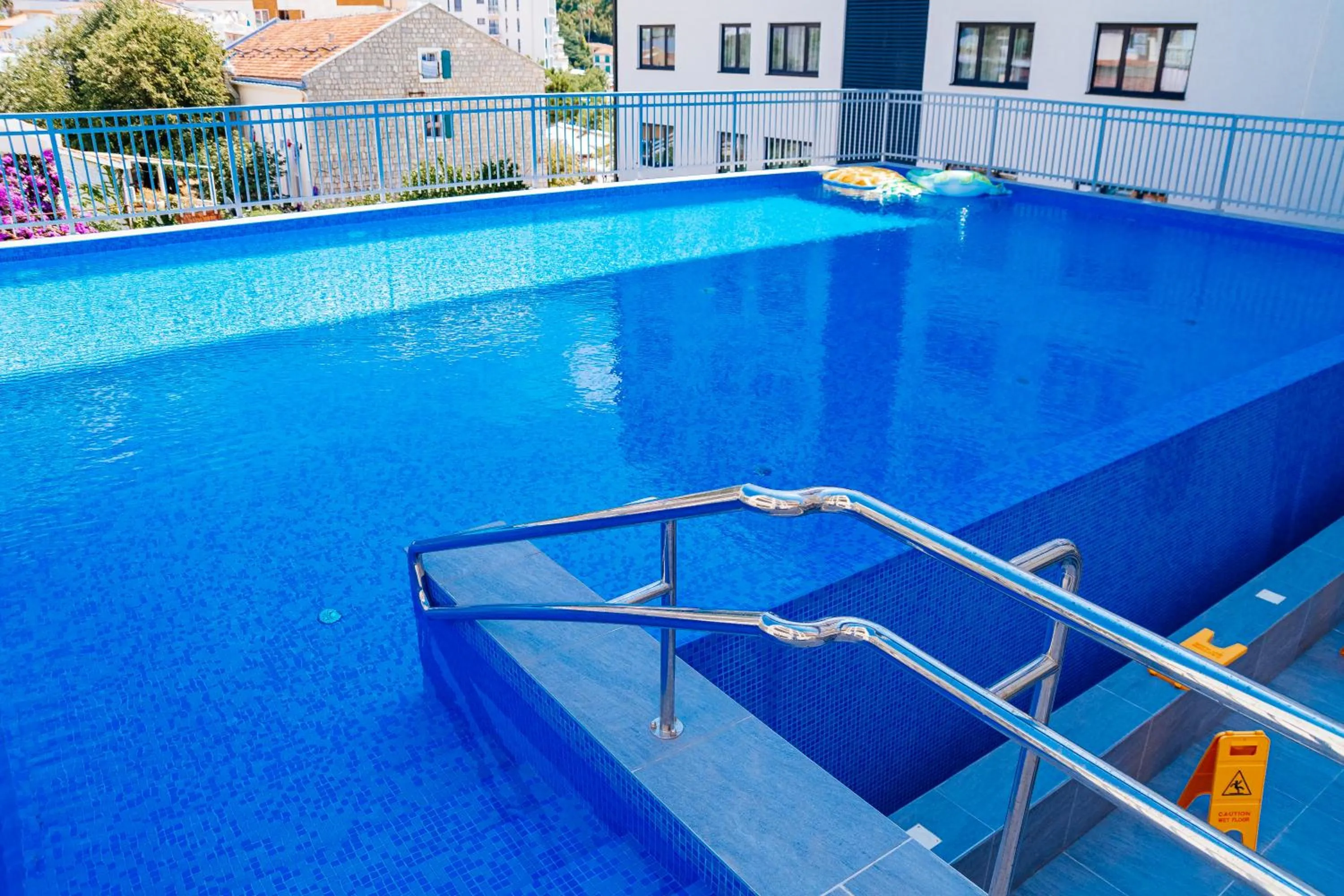 Swimming pool in Sunraf Luxe Apartments